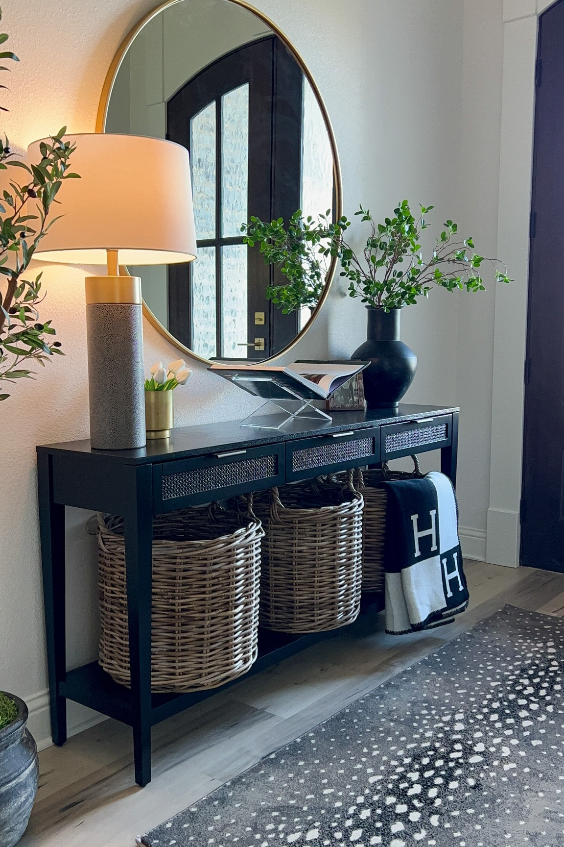 Entry way styling! ❤️ 

Entryway table, console table, lamp, brass decor, gold home accents, black and white home, throw blanket, luxe for less, designer look for less, baskets, coffee table book, fawn print, antelope print rug, acrylic book holder, Amazon home, olive tree 

#LTKSale #LTKhome #LTKunder50