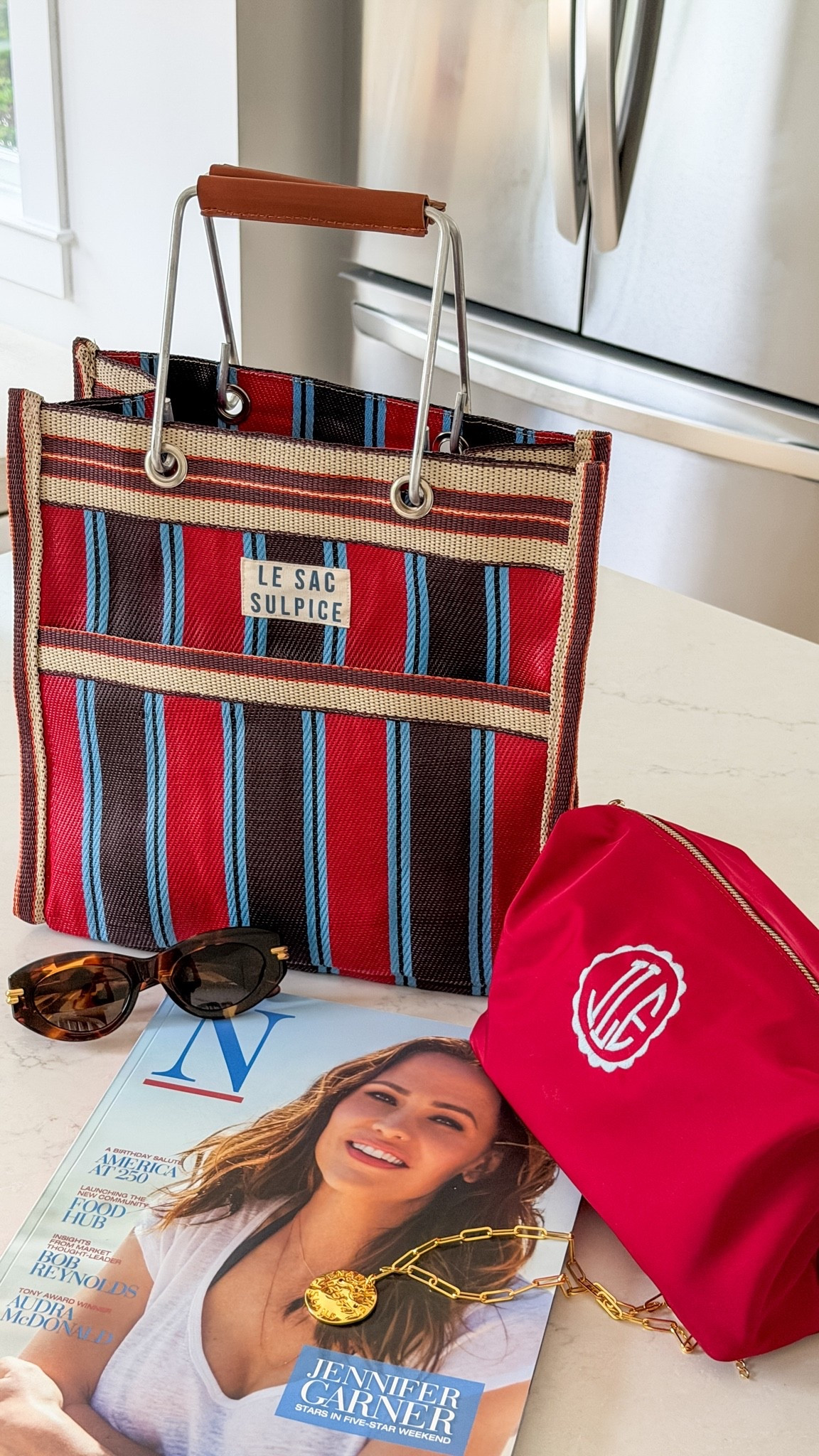 Nantucket travel essentials! I swear by these pieces to make vacation outfits and travel more effortless ⬇️

1. This gorgeous new bag by a new to me brand.
2. The Travel Pouch I designed with @Mark and Graham 
3. A copy of Nantucket Magazine
4. Sunnies by Bottega 
5. The new Nantucket necklace ⚓️

#LTKootd #LTKSeasonal #LTKTravel