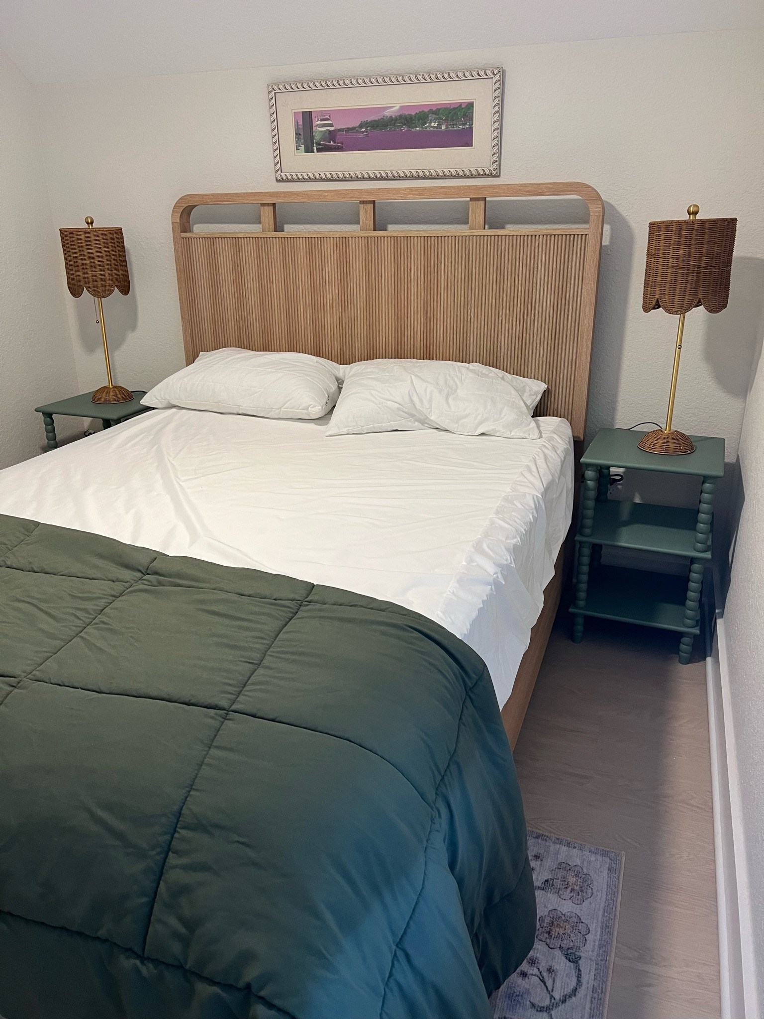 Beachy Bedroom 

Classic beachy, rattan lamps, scalloped, rattan, scalloped lamp, green table, floral rug

#LTKhome