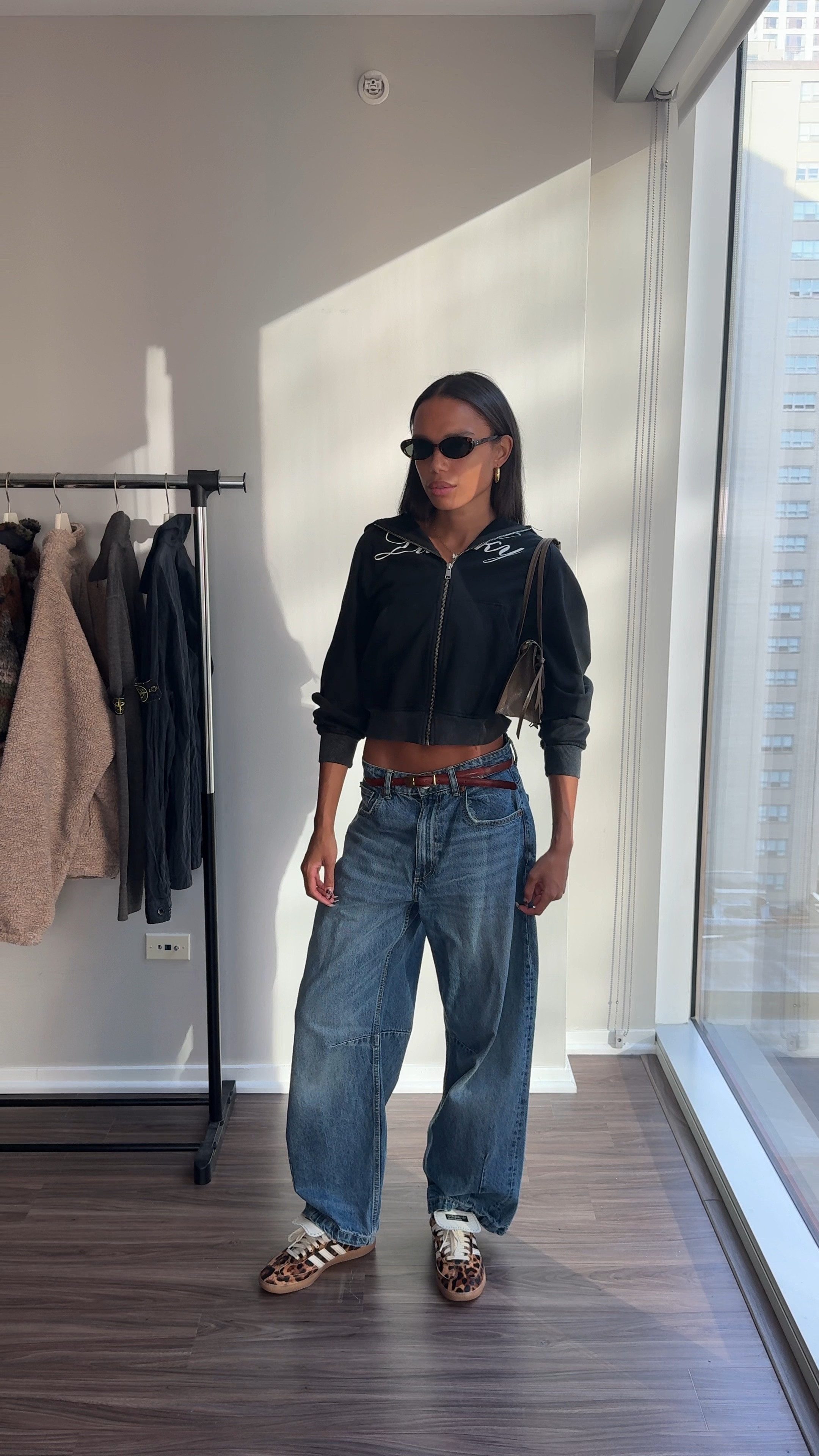 Exact Products:
Jeans - Zara (3607/025),
Belt - Zara (6399/208), 
Tank - Tank Air,
Zip Up - With Jean,
Shoes - Sambas,
Bag - Zara (6246/410),
Sunglasses - Amazon 