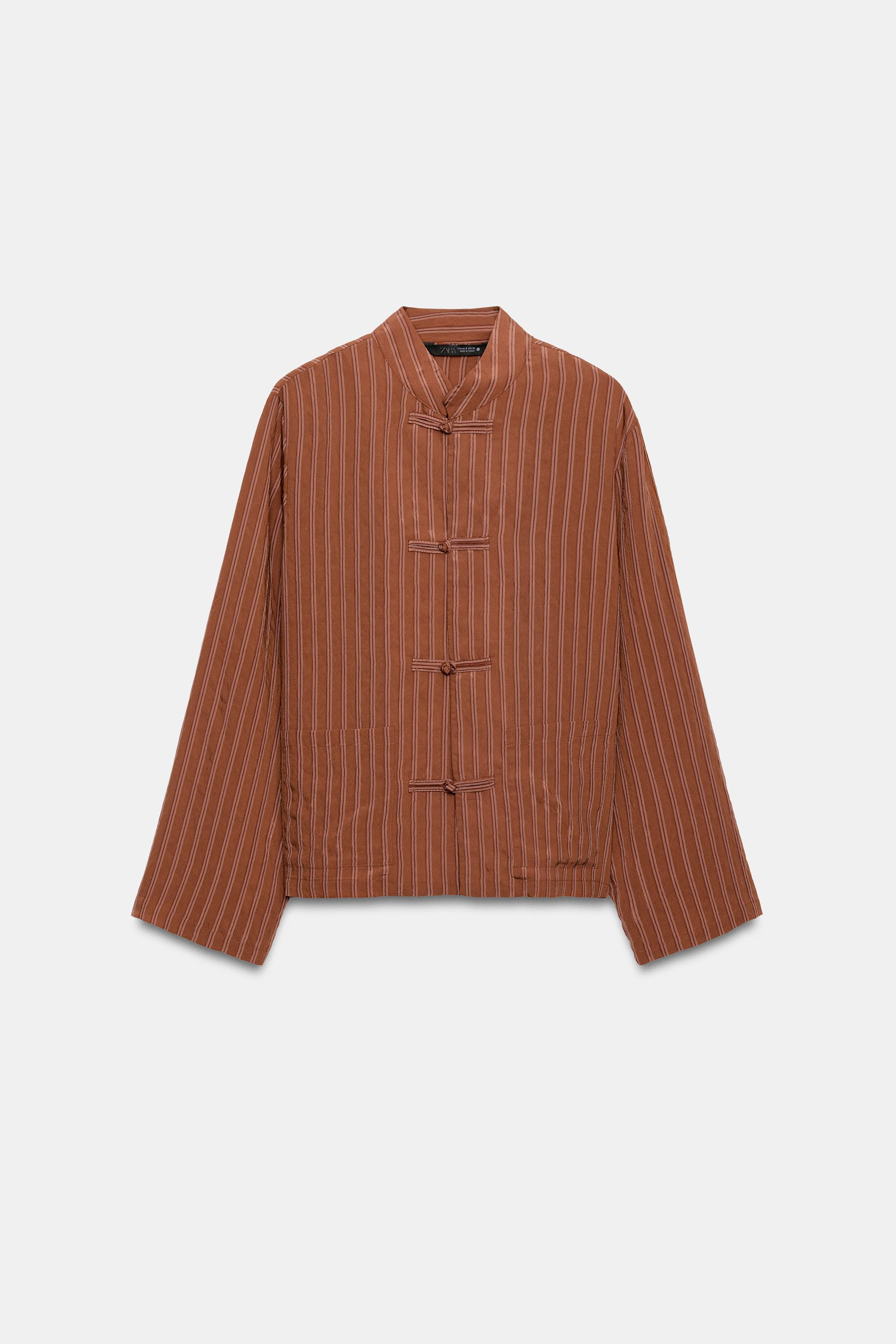 ZARA WOMAN COLLECTIONShirt made from a viscose blend yarn. Featuring a high neck and long sleeves... | Zara UK