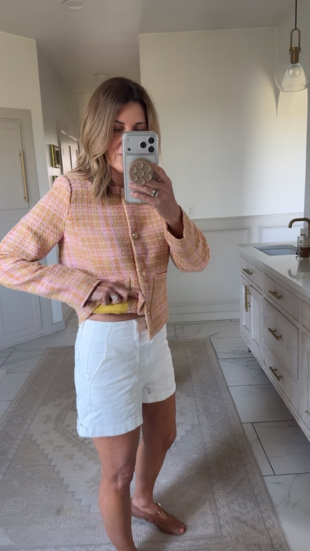 Wearing a small jacket and size 4 shorts 

#LTKOver40