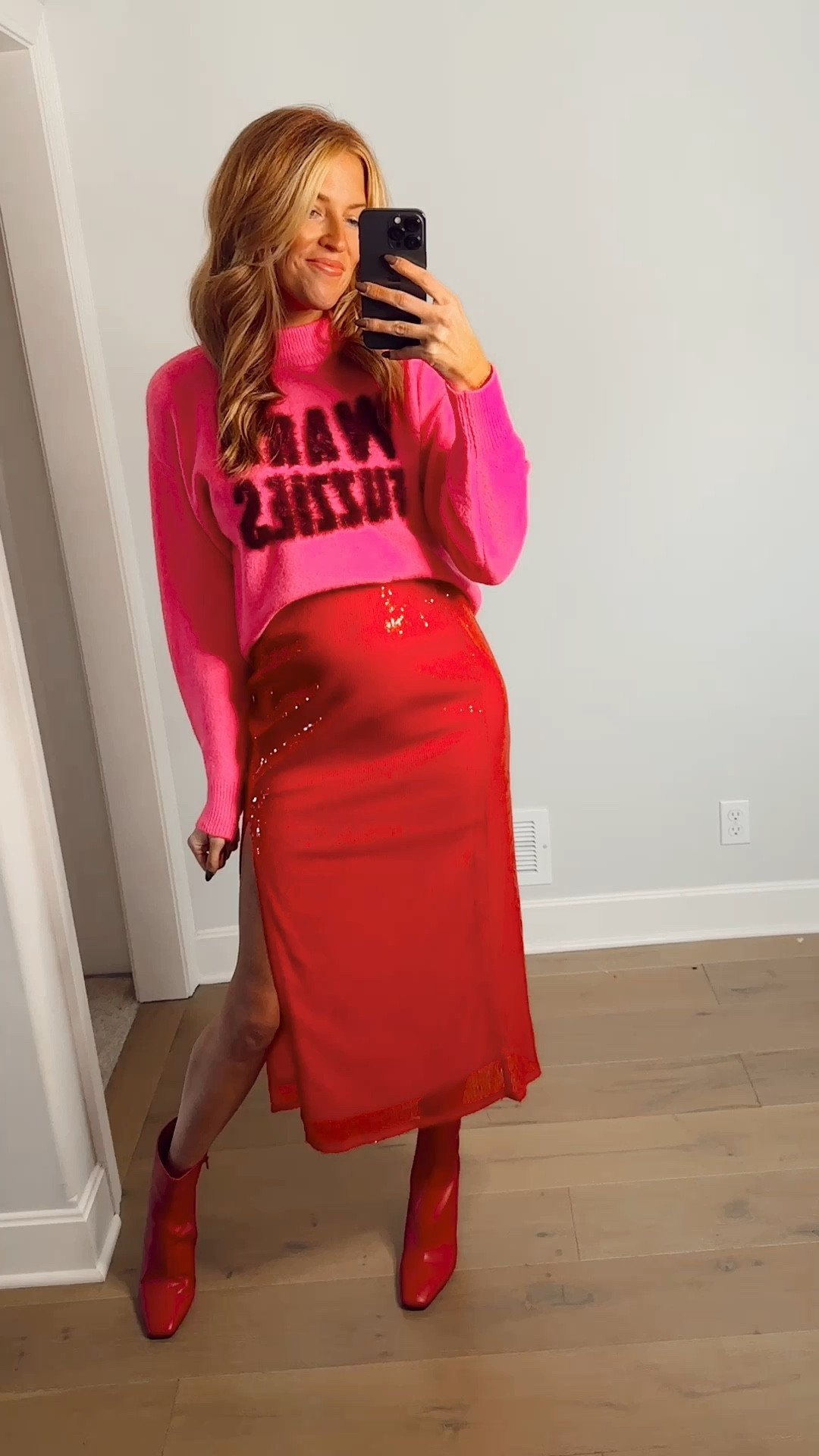 Holiday outfit red sequin skirt and red booties, pink sweater 

#LTKSeasonal #LTKHoliday #LTKsalealert