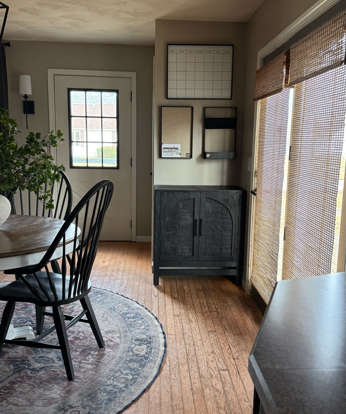 Family Command Center.

Modern Farmhouse Dining Room | Black Modern Dining Chairs | Round Vintage Rug | Ruggable Rug | Round Pedestal Dining Table | Spring Centerpiece | Spring Stem | Modern Sconce Lighting | Black Accent Cabinet | Modern Sideboard |

#LTKSeasonal #LTKHome