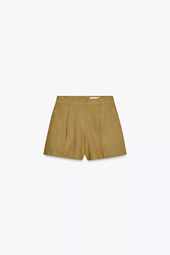 Linen blend shorts. High waist and front pleats. Front pockets and false pocket with flap at back... | Zara US