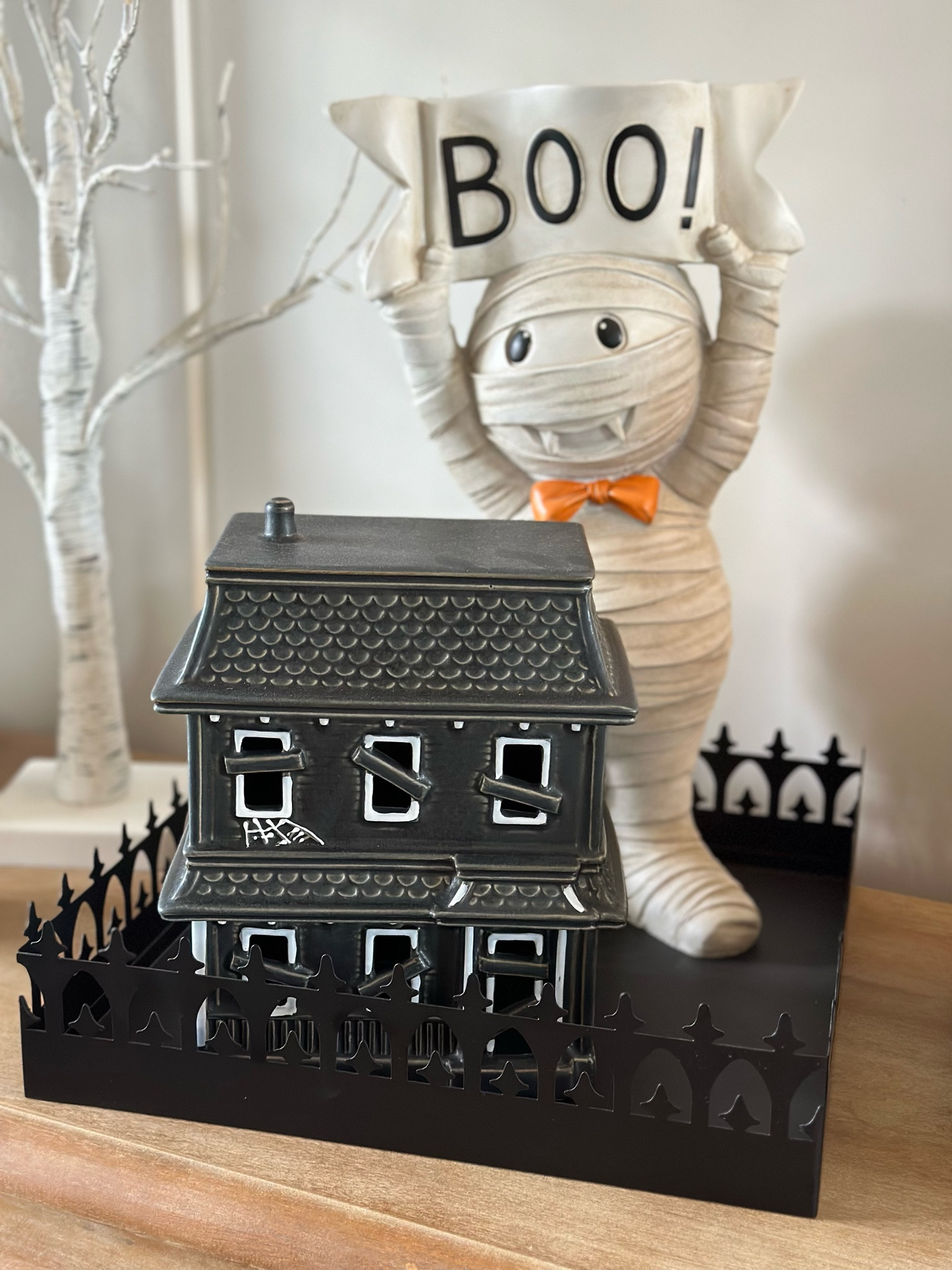 BOO! My scariest corner in the house... 🤣 I snagged this adorable vampire mummy at Home Goods a few months ago, my graveyard tray is now 50% OFF and my haunted house fits perfectly in the graveyard 🪦 Rounding it out with a light up birch tree. I'm completely in LOVE with this look on my entry table 🖤

#LTKHome #LTKSeasonal #LTKHalloween