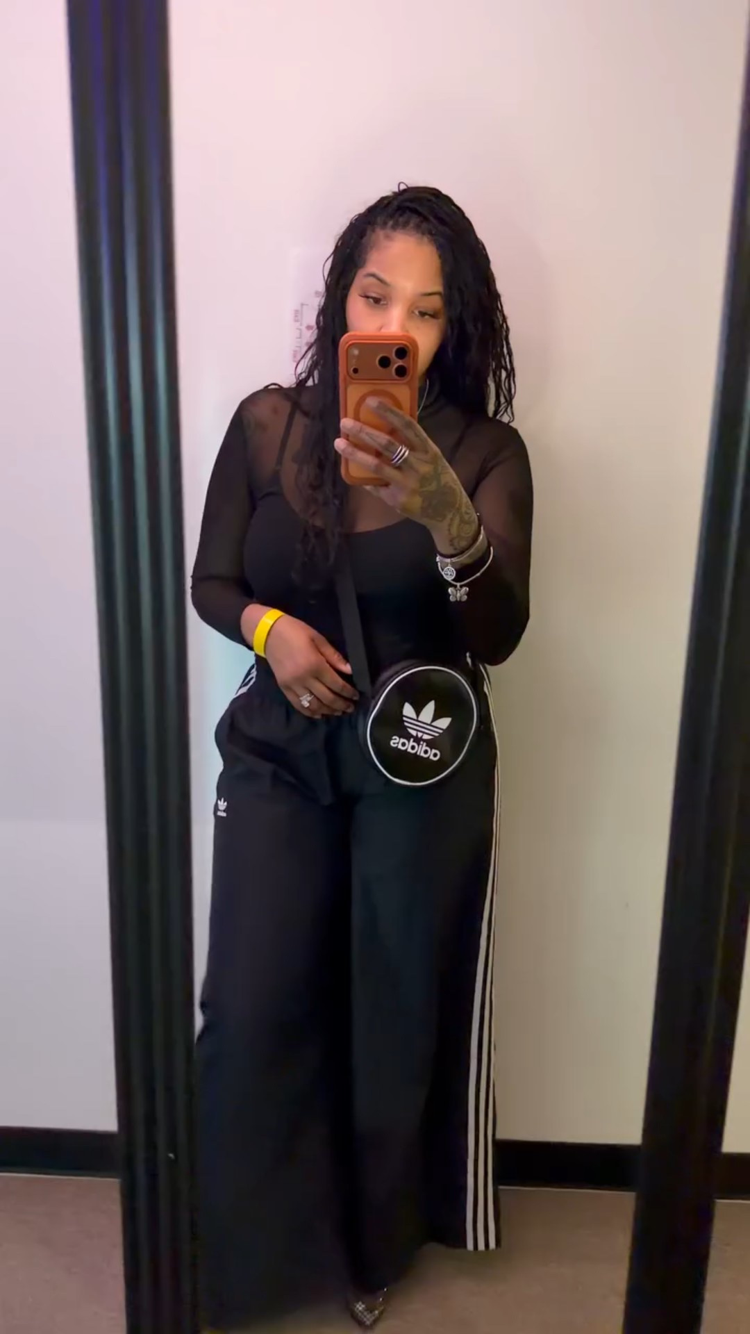 Sporty meets soft. 🖤

Adidas track pants styled with a sheer mesh top and mesh heeled booties for that soft contrast.

#LTKOver40 #LTKdayinmylife #LTKootd