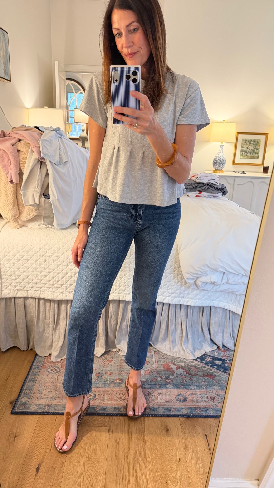 Short-sleeve in February? Yes, please 🙋🏻‍♀️
I wore this pleated Anthro vibes tee so much last summer and fall that I just ordered another in a pretty light coral color and I’m eyeing the apricot too! It’s so easy to throw on but the pleats elevate…the coral is going to be so cute with white denim and shorts as well, I’m wearing a size S!

#LTKootd