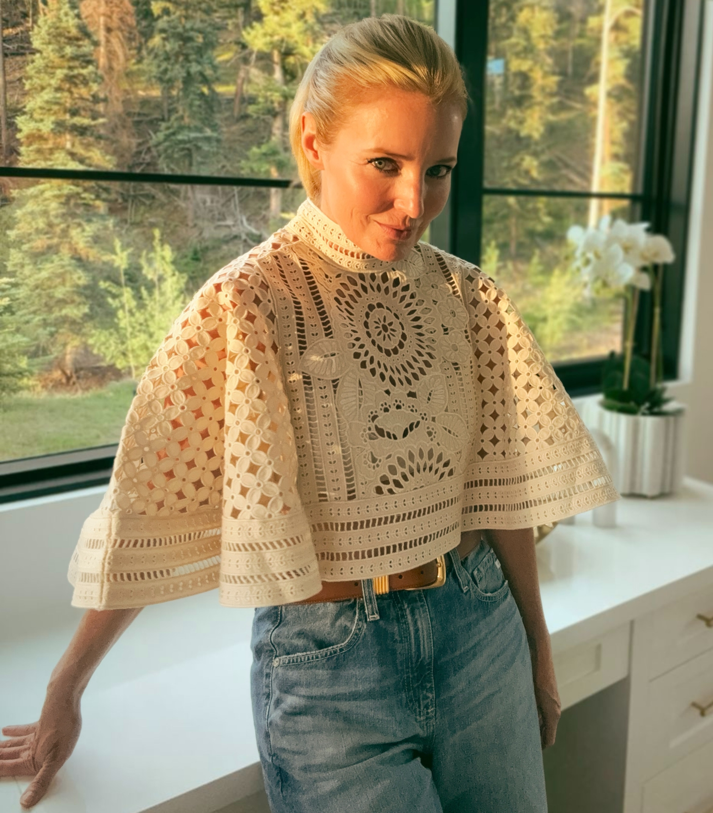 Golden hour light and a Zimmermann broderie cape; this combination was made for each other. 

The intricate cutwork detail in this cream cape catches light in the most beautiful way. Wide cape sleeves, mock neck, cropped length that sits perfectly over high waist denim. This is what investing in a statement piece looks like! 

 #LTKgrwm #LTKootd #LTKOver40