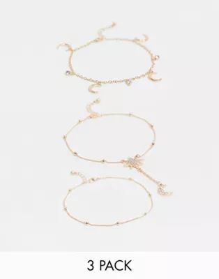 ASOS DESIGN pack of 3 anklets with crystal star and moon charms in gold tone | ASOS (Global)