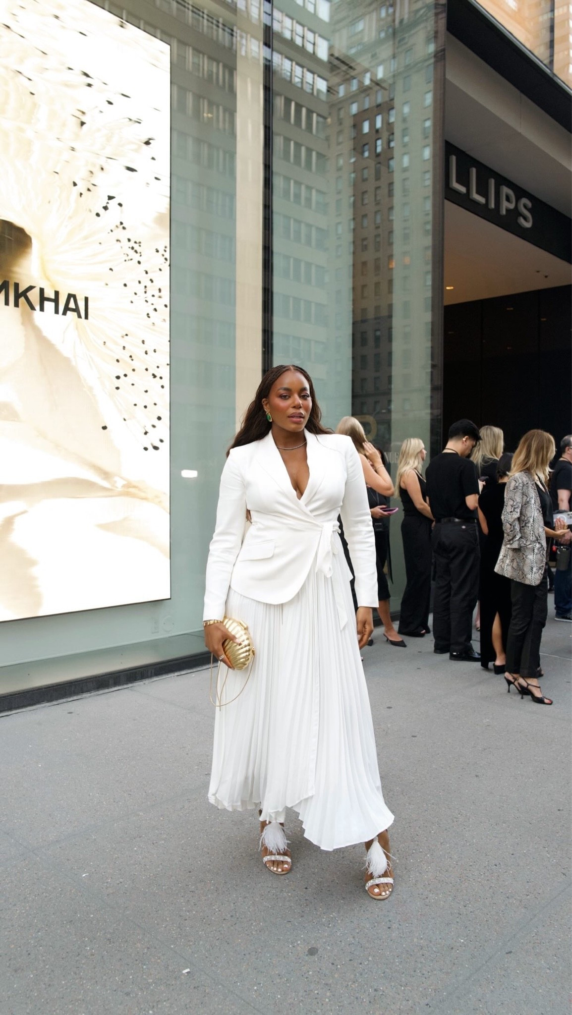 Happy NYFW! So excited for the Simhkai runway show - one of my favorite designer brands. Wearing the most gorgeous white dress with gold clutch along with white feather heels .. For more links to fall outfits women, wedding guest dress summer, date night outfits, fall wedding guest dresses, country concert outfits, teacher outfits, business casual workwear, fall decor, concert outfit ideas, work outfits, follow me on LTK! ✨

#LTKfall #LTKdresses #LTKworkwear