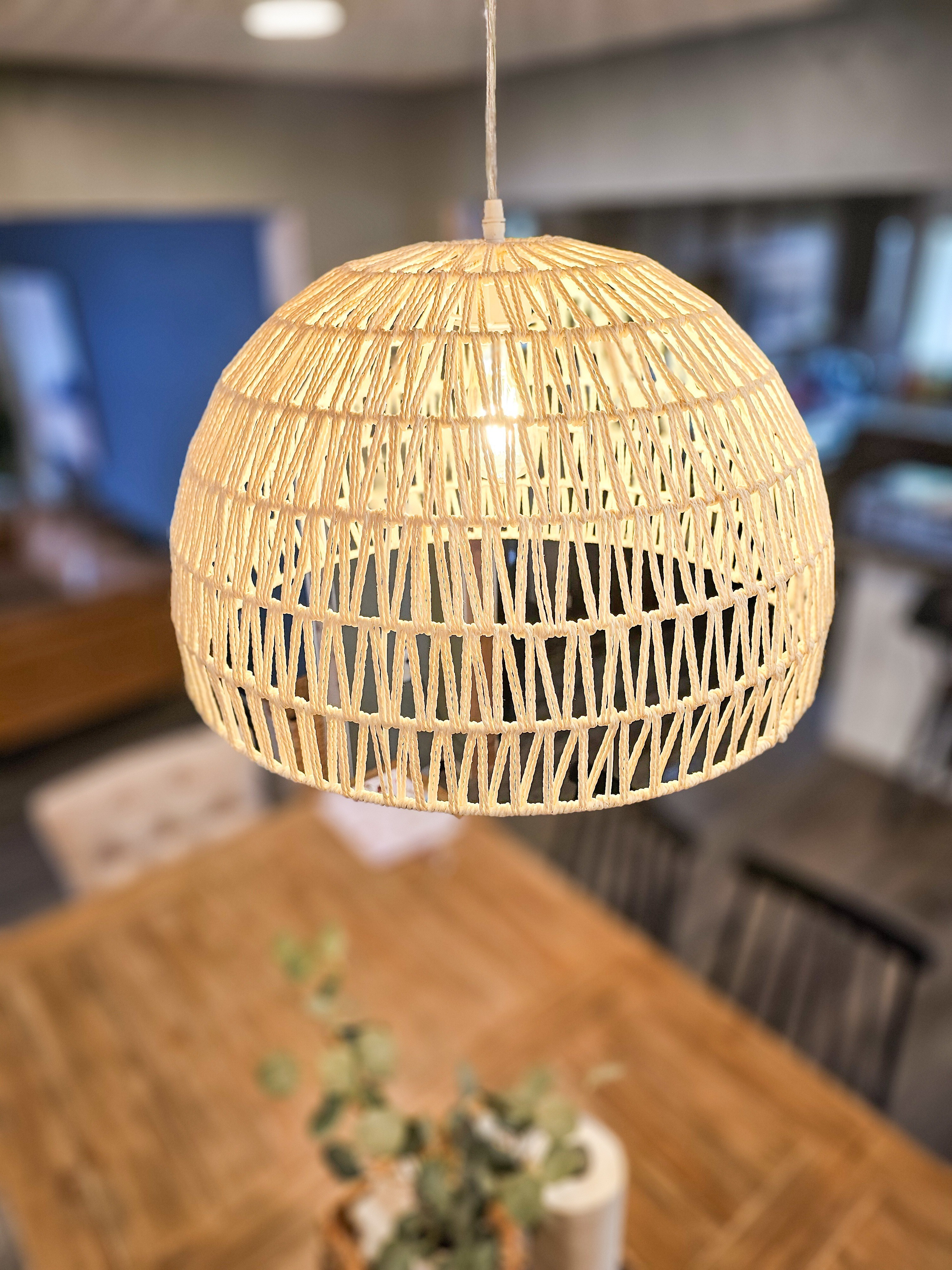 This rattan light fixture brings so much warmth into the dining room, softening the space with texture without competing with anything else going on. It's proof a lighting swap alone can completely change the feel of a room. #rattanlighting #diningroomdecor 

 #LTKHome