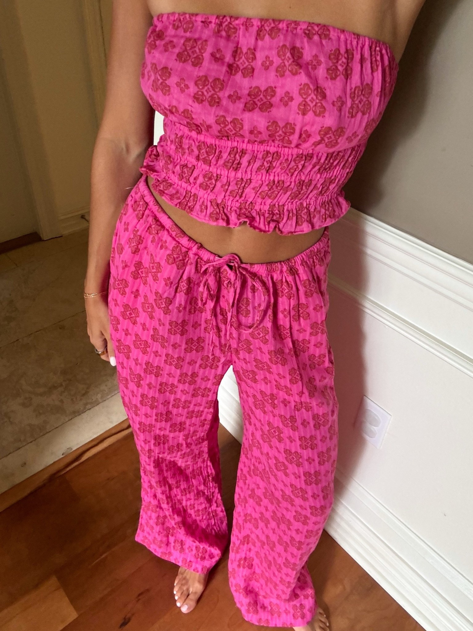 Obsessed with this pink set for summer💖 lightweight and comfy!! so cute for beach trips or summer travels! wearing size XS top and M bottom (could’ve done S top) the pants have a stretchy waist band and drawstring:)

#LTKootd #LTKSeasonal #LTKTravel