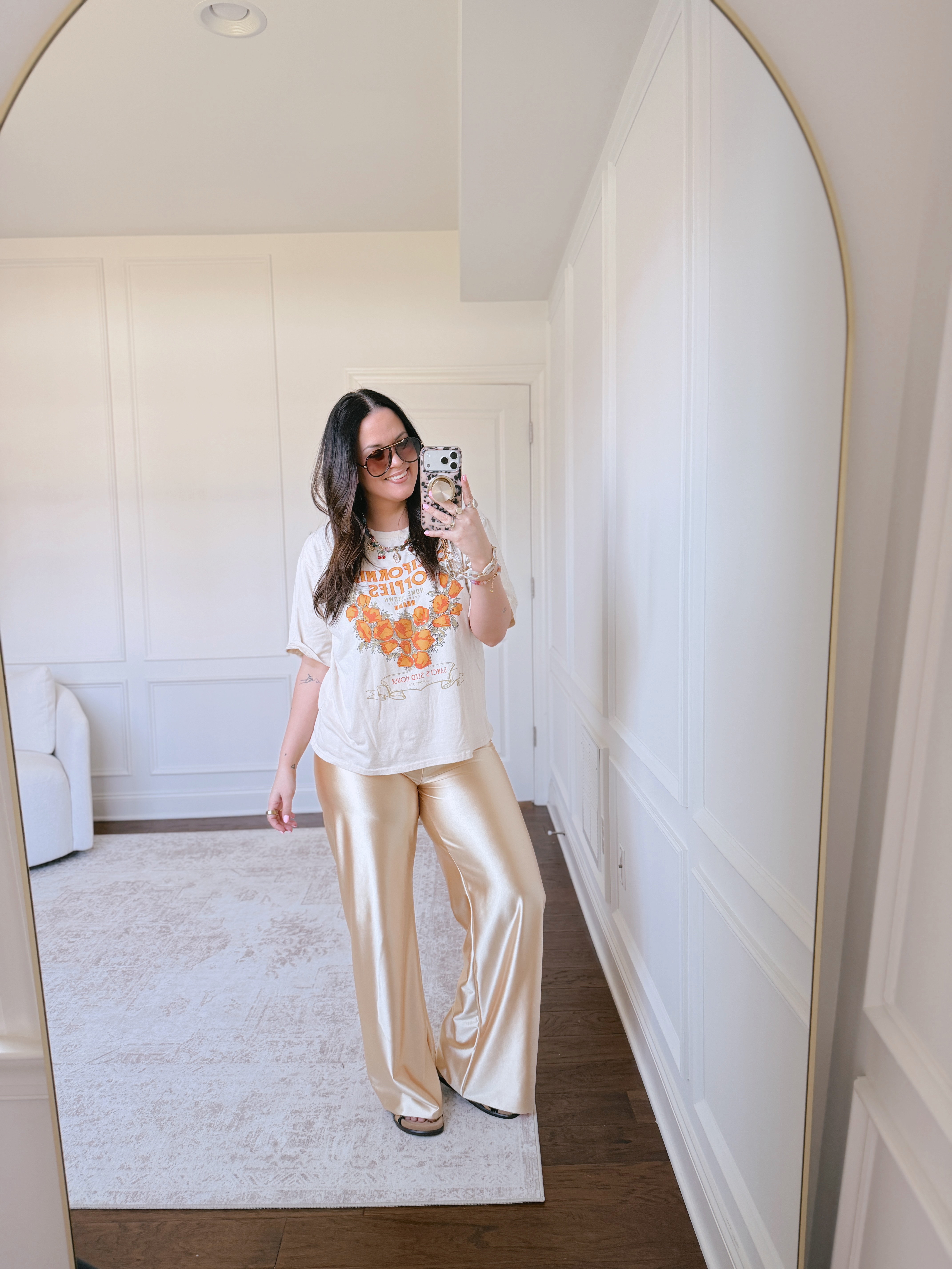 Love dressing down these wrinkle free satin pants with a graphic tee and sneakers.. wearing a large in everything 

 #LTKootd #LTKSeasonal #LTKMidsize