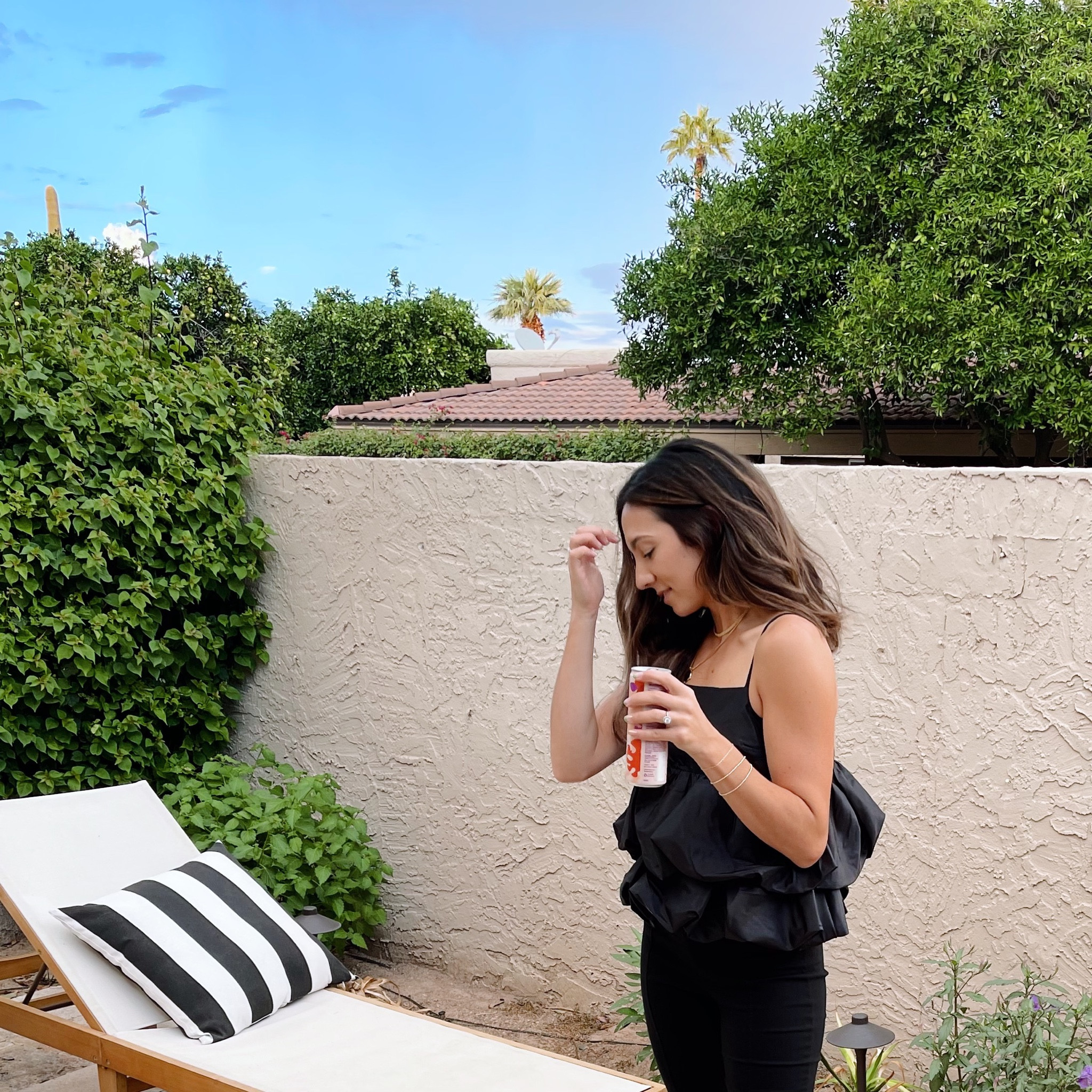 Black tank and slit bottom pants 

#LTKSeasonal #LTKstyletip #LTKunder50