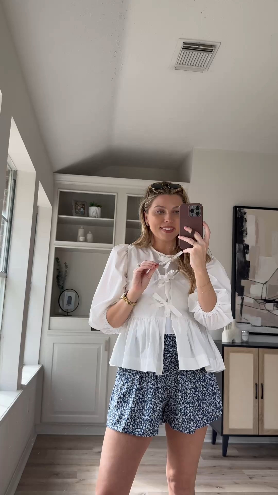 Bump friendly spring outfit | these floral shorts are so cute and super stretchy and work great with a bump. Wearing size S in the bow top, size M on the sports bra tank and shorts. Sandals fit tts. 

#LTKBump #LTKWatchNow #LTKStyleTip