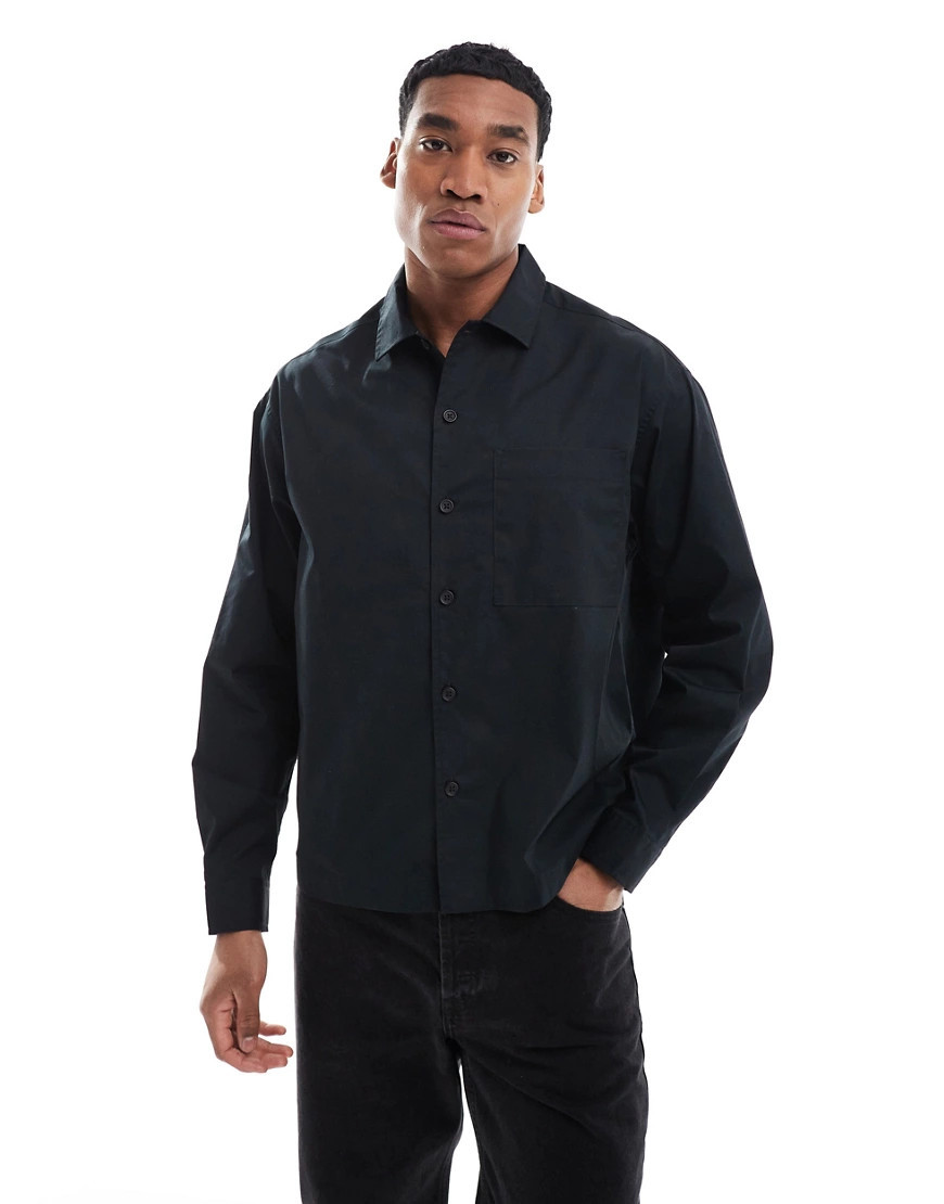 ASOS DESIGN boxy oversized button poplin shirt in black | ASOS (Global)