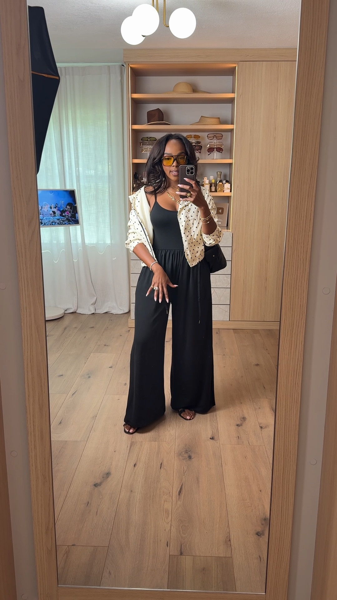 Scroll to shop this elevated everyday black set 🖤

A flowy wide-leg pant paired with a fitted top creates that effortless, put-together look, while the lightweight layer adds just enough detail to elevate it. Easy to dress up or down, making it a go-to outfit you’ll rewear on repeat and keep your cost per wear low.

Perfect for errands, travel, casual days, and everyday wear.

📏 Measurements: 5’4”, 140 lbs, 34D bust, 27” waist, 40” hips

Follow me on Instagram and YouTube @kirasfashionfinds