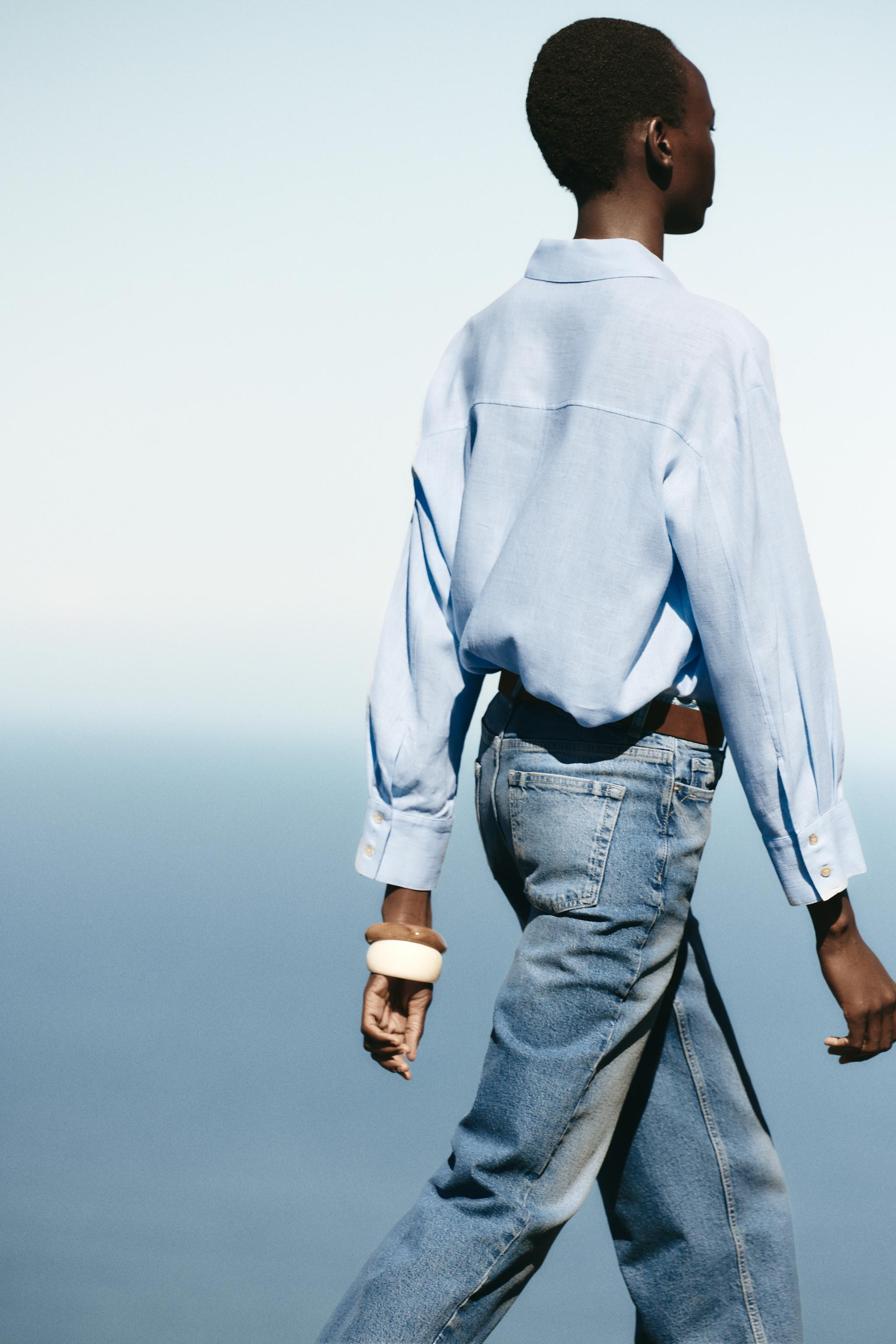 HIGH WAIST - WIDE LEG - CROPPED LENGTH - COMFORTHigh-waisted jeans with belt and five pockets. Wi... | Zara US