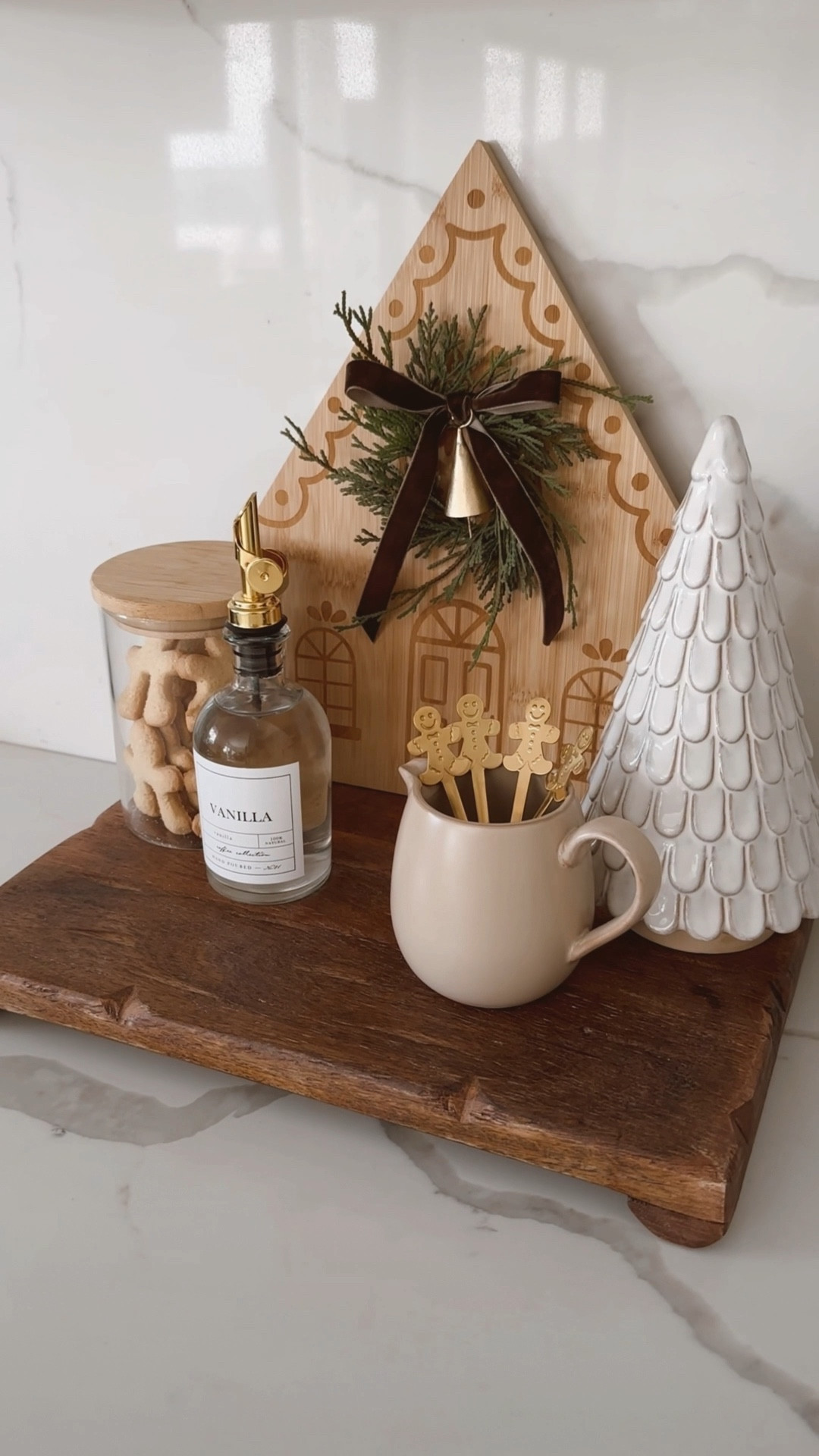 Christmas coffee bar 🌲🤎 

Details:

+ my riser is the large size 

+gingerbread mug topper cookies are from Aldi (Trader joes also has them)

#christmasdecor #kitchendecor #riser #kitchenvignette #coffeecorner #coffeebar #christmaskitchendecor #holidaydecor 

#LTKhome #LTKHoliday #LTKfindsunder50