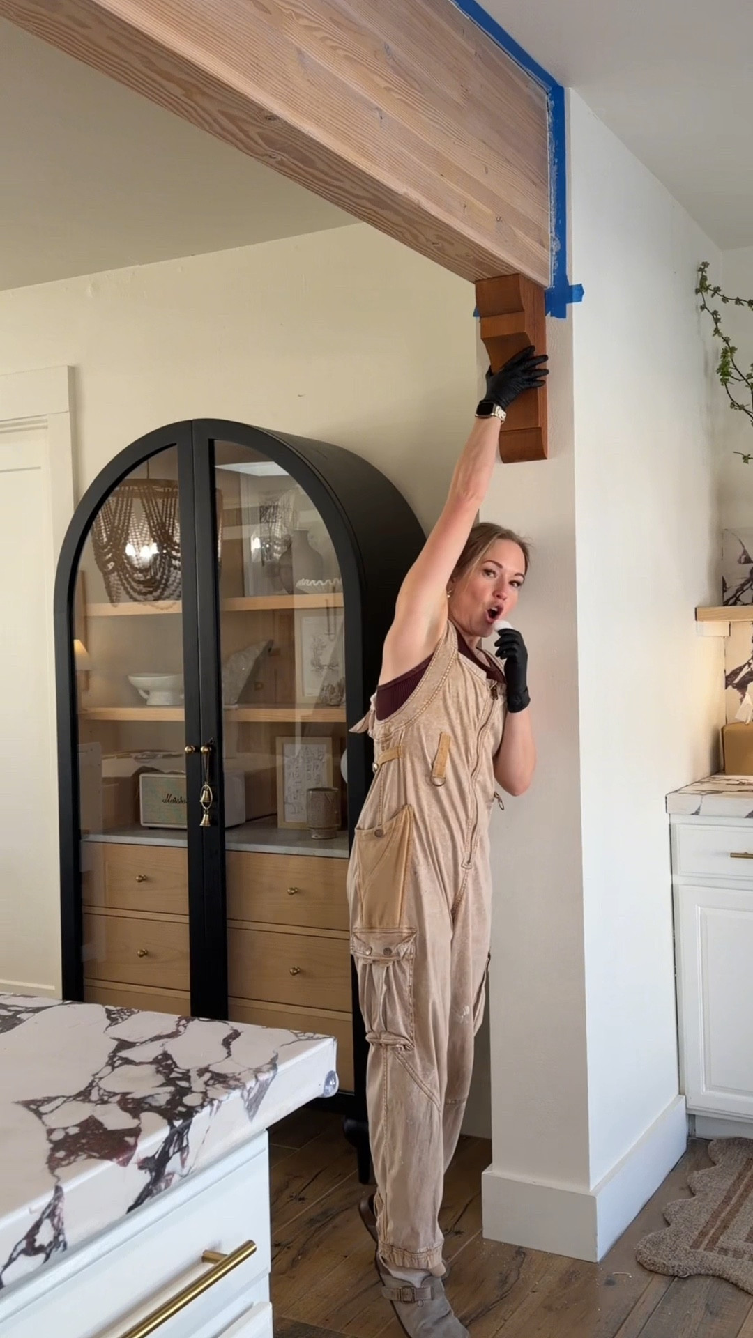 I’ve been wanting to stain this kitchen beam for FIVE years… and a random Pinterest pin finally pushed me to stop overthinking it and just do it.

I started with a white pickling wash, layered espresso stain over it for depth, matched the corbels, and used an aggressive amount of painter’s tape to hold everything in place while it cured 🙃

And now? It looks like it’s always been here. The coziest, old-world touch my kitchen was missing.

If you’ve had a project sitting on your mental to-do list for years… this is your sign.

#LTKHome