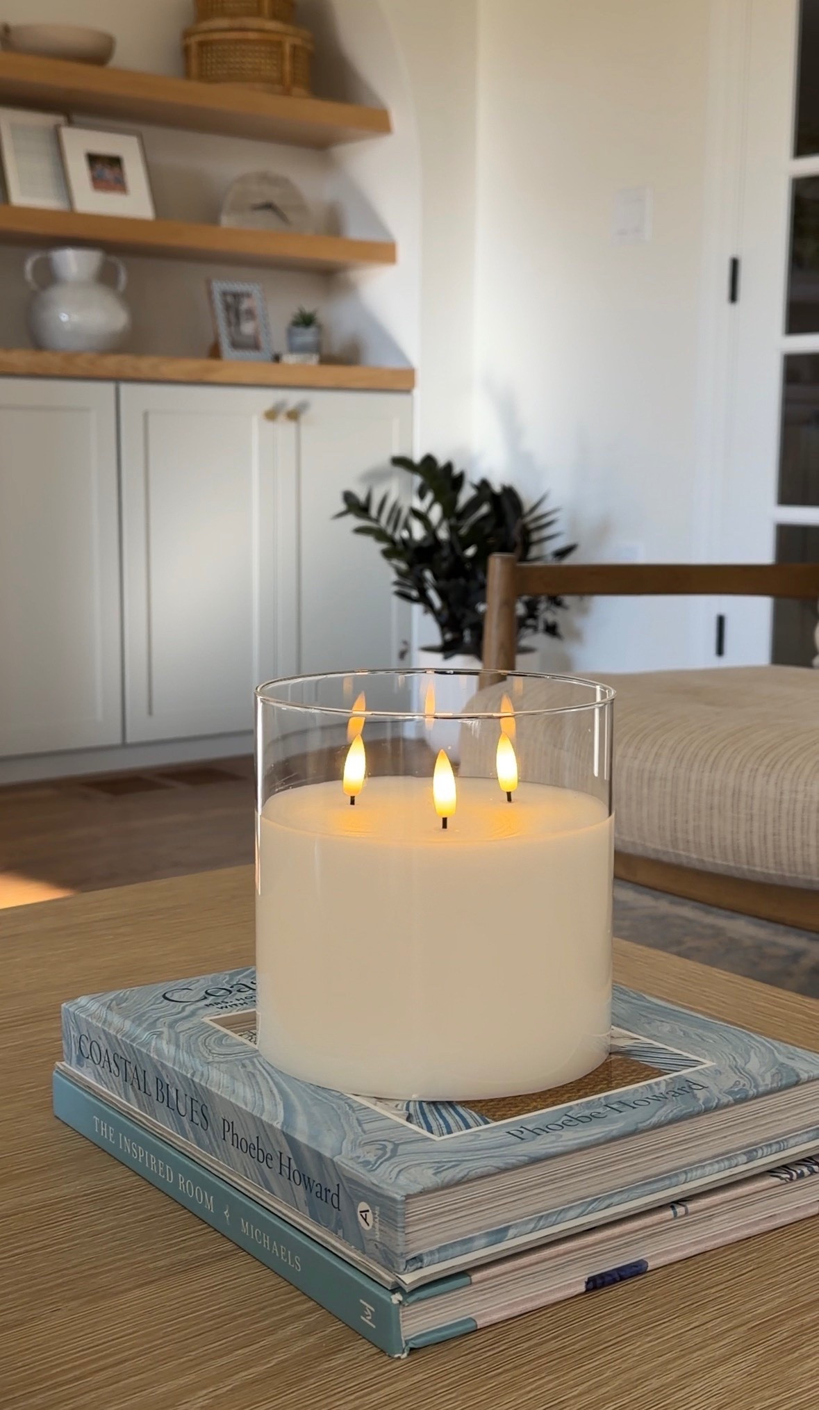 This large 3 wick battery operated candle adds the perfect ambiance to our family room coffee table! Put it on a timer and you won’t need the stress of blowing out a flame!

#LTKHome