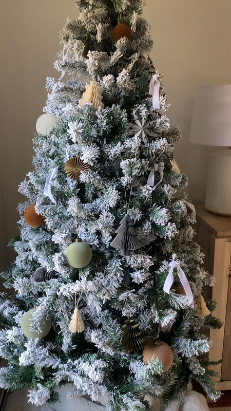 My favorite flocked tree for the holiday season! It’s affordable. Add some lights for a beautiful glow for the holiday season. Beautiful decorated or on own! 

holiday decor, Christmas decor, Christmas tree

#LTKhome #LTKfindsunder100 #LTKHoliday
