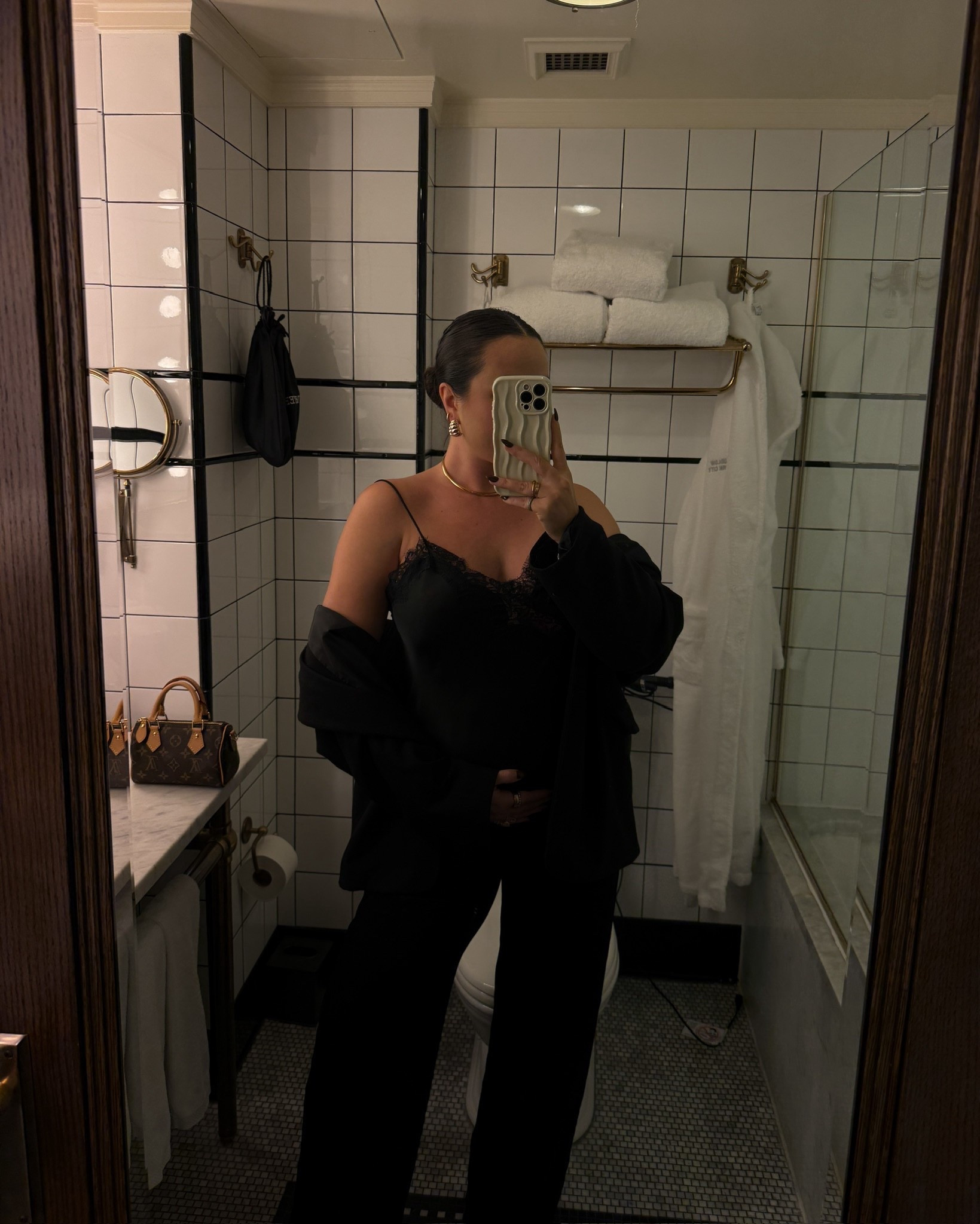 Chic all black outfit for fall - perfect for a casual dinner outfit. These satin pants have been my go-to this season! 

#LTKFindsUnder100 #LTKSeasonal #LTKStyleTip