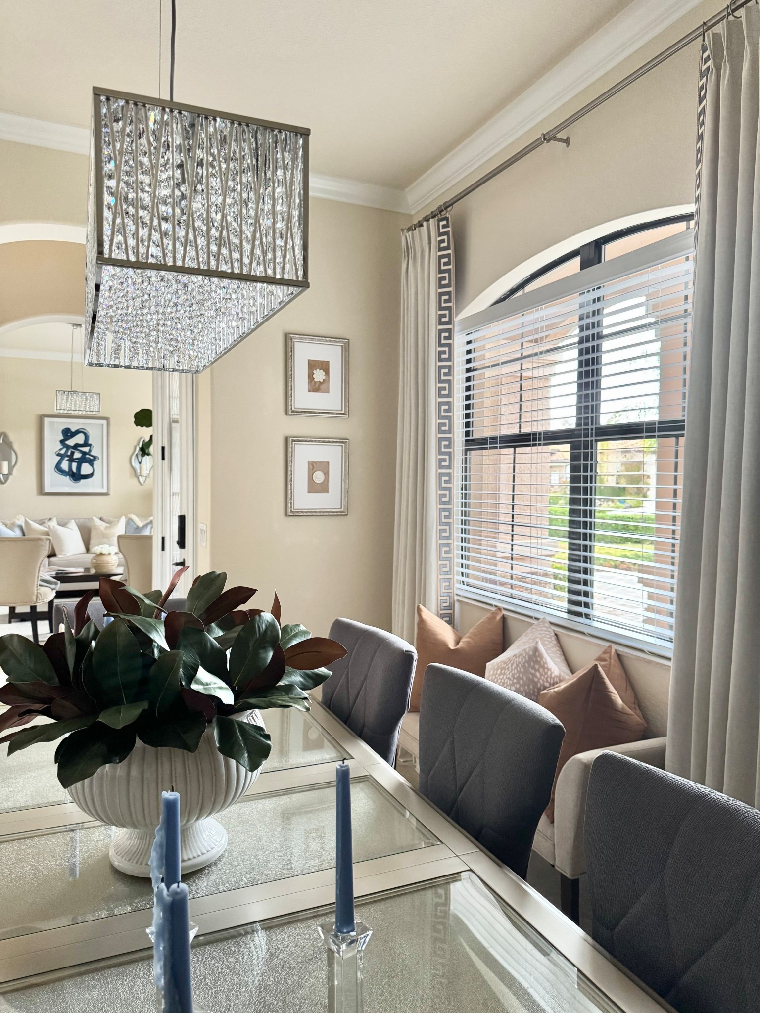 Our cozy dining room view with a beautiful blend of warm neutrals, classic blues, rich wood tones, chrome & silver  fixtures, and faux greenery!🩵💙🤎🩶🍃

Home Decor | Dining Room Decor | Warm Neutral Decor | Classic Blues | Transitional Decor | Transitional Modern Coastal | Traditional Decor | Brown & Blue Decor | Classic Decor | Timeless Decor | Spring Decor

#LTKHome