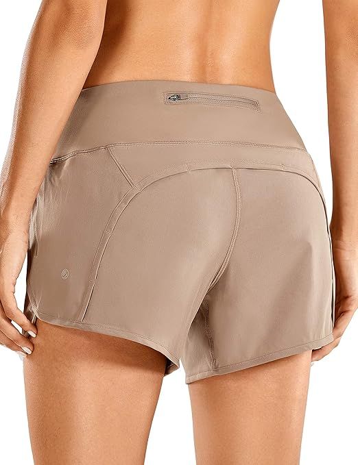 CRZ YOGA Women's Quick-Dry Athletic Sports Running Workout Shorts with Zip Pocket - 4 Inches | Amazon (US)