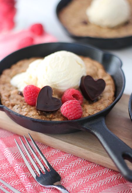Make these chocolate chunk skillet cookies for Valentine’s Day. These bake up with crispy edges and warm, ooey-gooey middles. Perfect for sharing!
You can use these mini cast iron skillets for other desserts, appetizers, meat pies and more. Ideal for cooking outdoors and camping too.

#LTKhome #LTKunder50 #LTKSeasonal