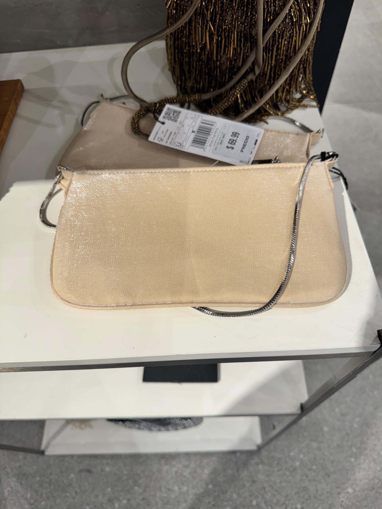 I thought this small shiny purse from Mango was perfect for when I go to luncheons and networking events. I got it on sale for about a third of the price too!

#LTKWorkwear #LTKFindsUnder50 #LTKItBag