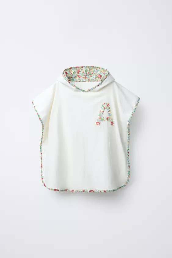 TEXTURED TOWEL PONCHO WITH FLORAL TRIM | Zara US