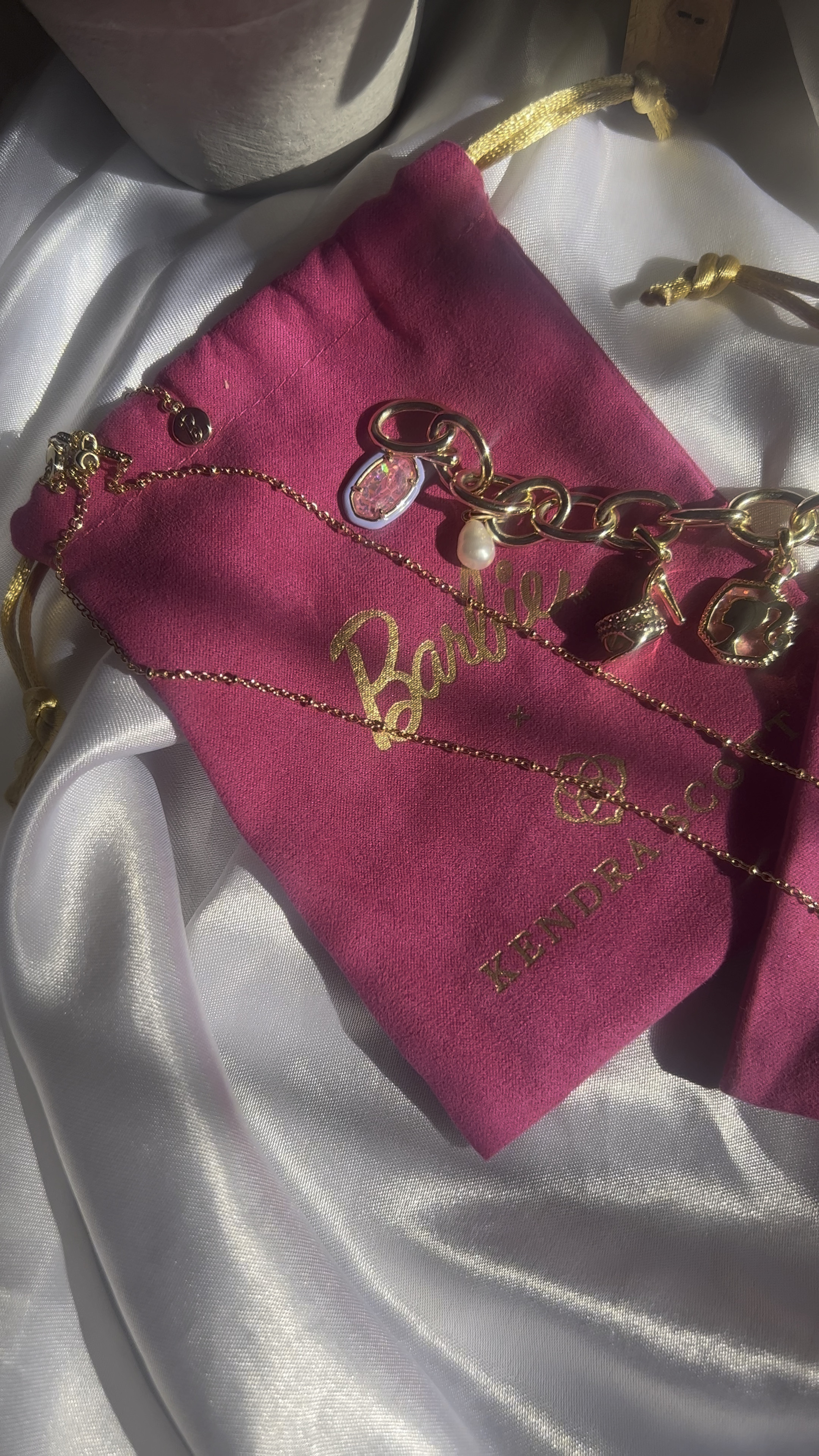 Shop Kendra Scott's latest Barbie collaboration before it sells out! My charm bracelet is already sold out, but my necklace and several pieces from the collection are still available and they are perfect fpr any Barbie girl! #kendrascottbarbie #barbie #barbiekendrascott #kendrascottjewelry

#LTKunder100 #LTKFind #LTKstyletip