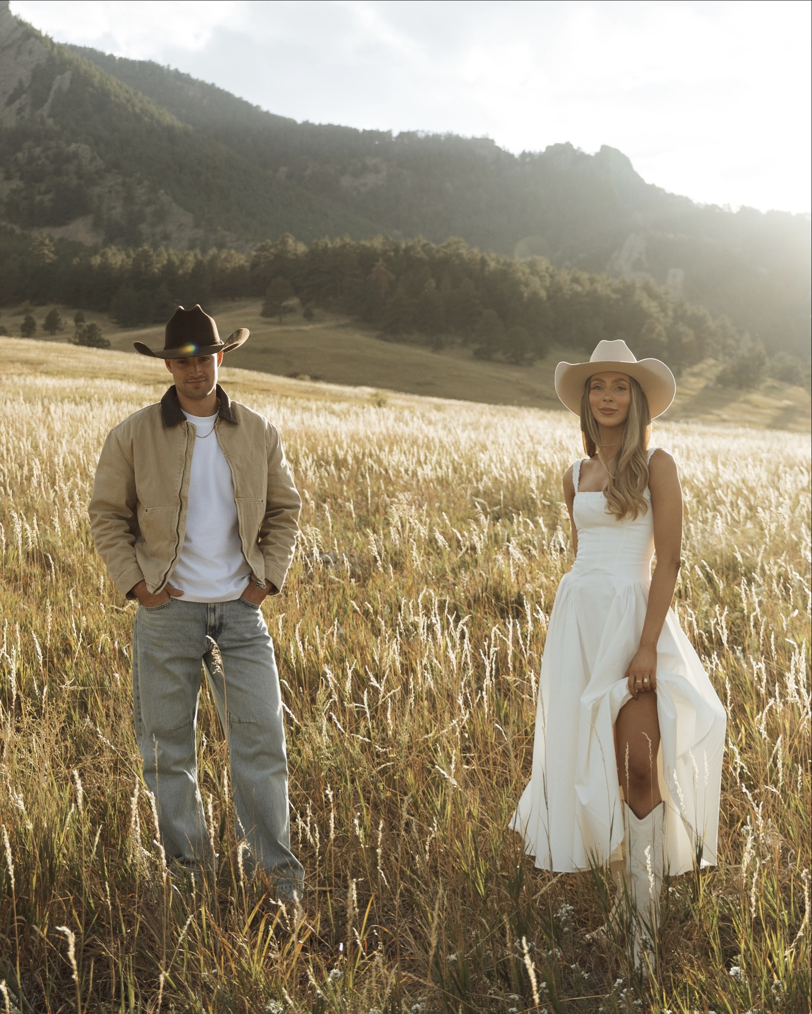 Engagement Photoshoot Outfits w/some Romantic Western Vibes🤍 | white long dress: House of CB, cowboy boots: Dolce Vita, cowboy hats: Cody James, Barn jacket: Zara, workwear jeans: Abercrombie, White tee: Abercrombie, Chelsea boots: Aldo 

#engagementphotos #bridetobe #wedding #couplephotoshoot #western #country #2025bride #2026bride #engagementdress 

#LTKStyleTip #LTKWedding