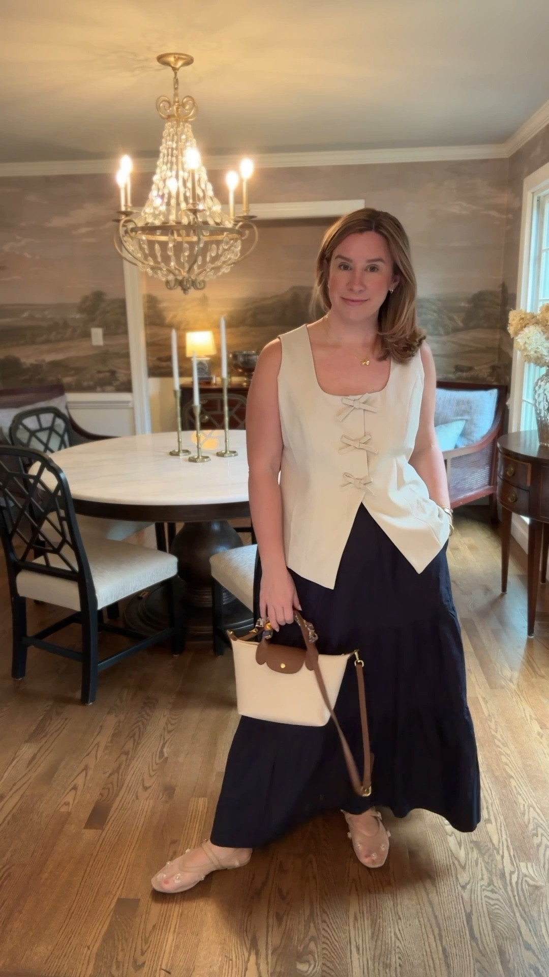 Packing for a trip and totally loving the vest trend this season! This one is running a bit big—I’m wearing a large but will be swapping for a medium. It’s such a versatile piece, perfect over this skirt or paired with high-waisted jeans. A definite must-have! 

#LTKFindsUnder50 #LTKMidsize