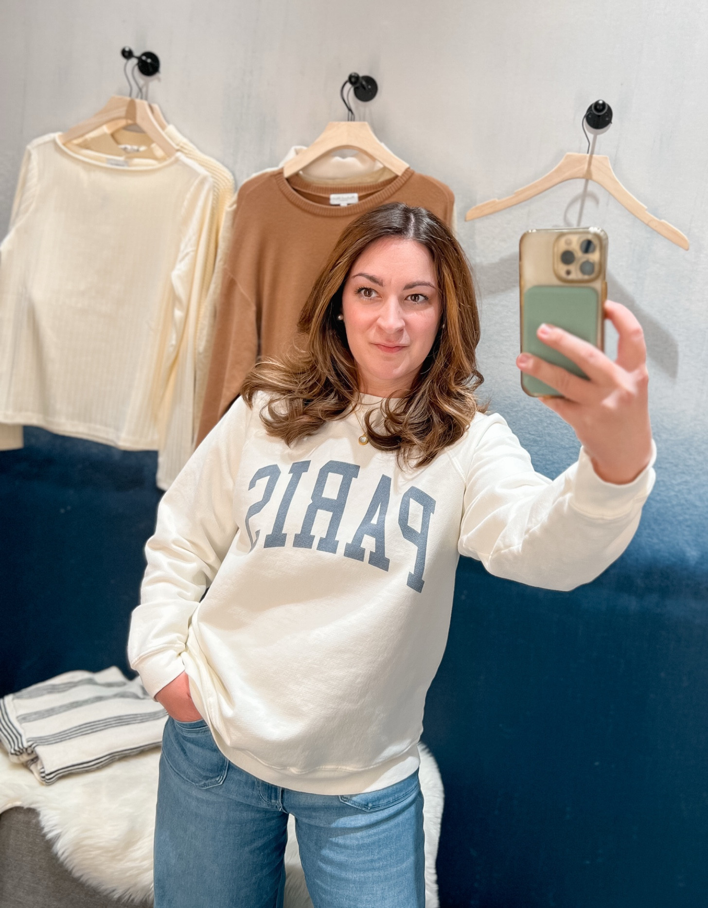 No good Europe travel blogger would leave the store without purchasing this adorable Paris sweatshirt 😍 #paris #parissweatshirt #sweatshirt #evereve