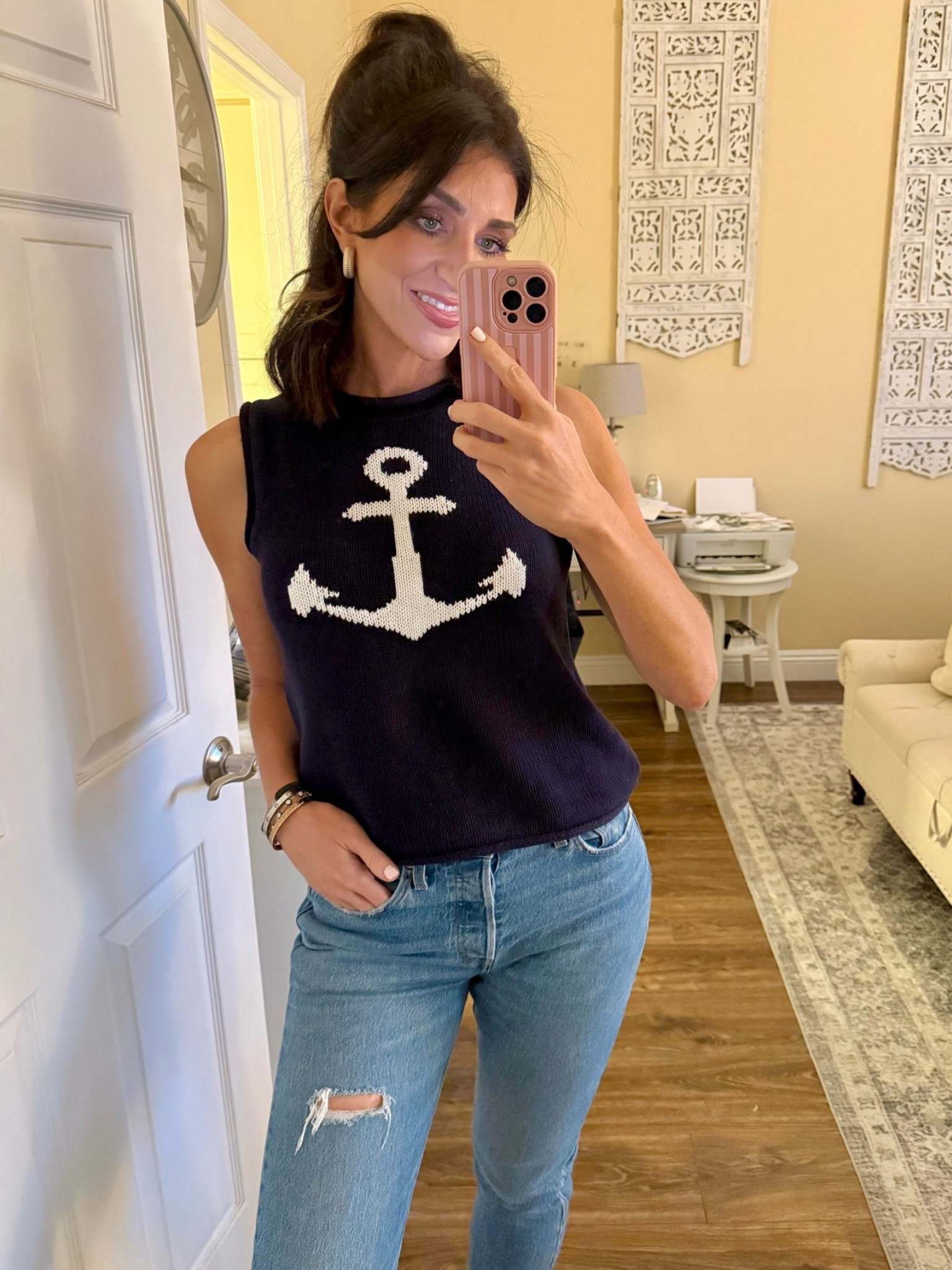 Wearing a small in the sweater tank and a 27 long in the jeans.

#LTKootd