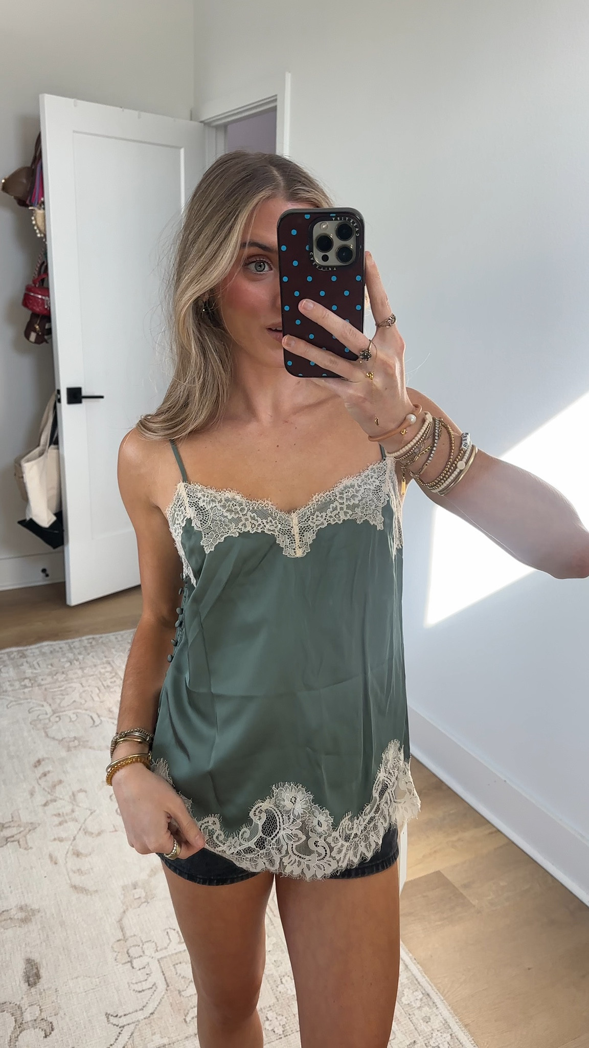 @abercrombie  size XS in everything! Lace and Satin Slip Cami

Easy-fitting cami top in our high shine satin fabric and body-skimming silhouette. Features functional side buttons, a V-neckline and lace-trim details throughout.

#LTKgrwm #LTKSeasonal #LTKootd
