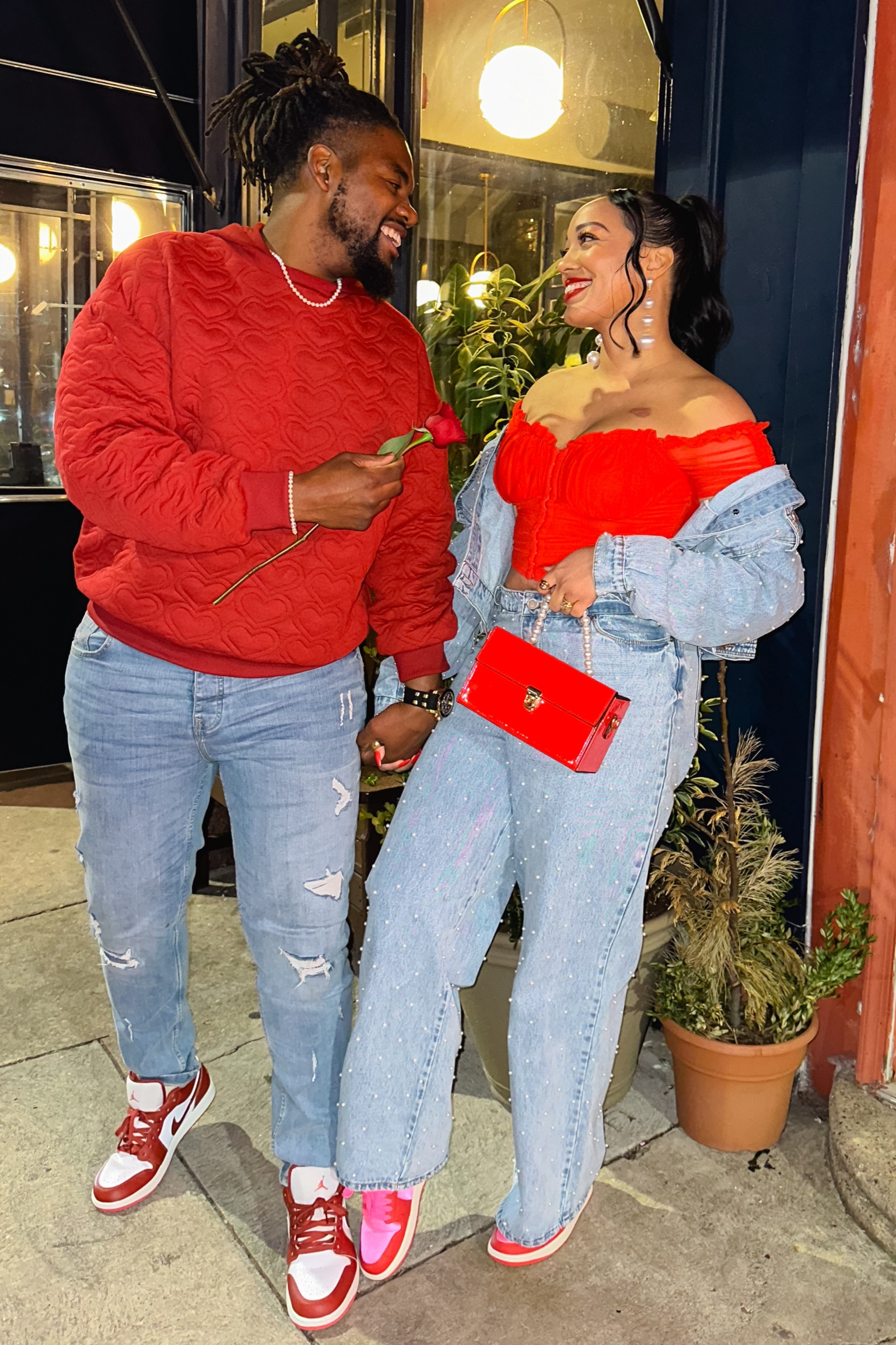 Pearl Jean outfit with a red runched crop top from Windsor matching husbands red shirt and red dunks 

#LTKmens #LTKmidsize #LTKshoecrush