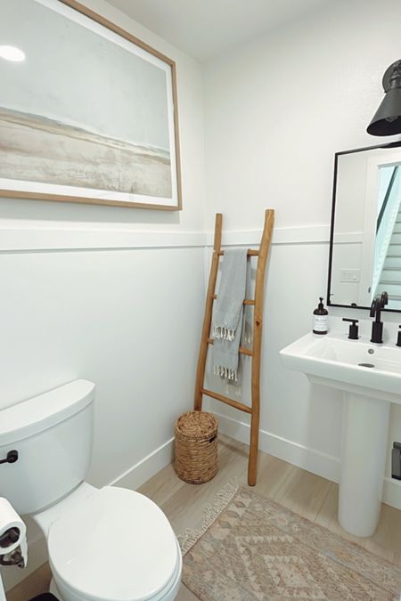 This powder room is clean and simple but has a lot of impact! 

#ltkhome #bathroom #powderbathroom #guestbathroom
