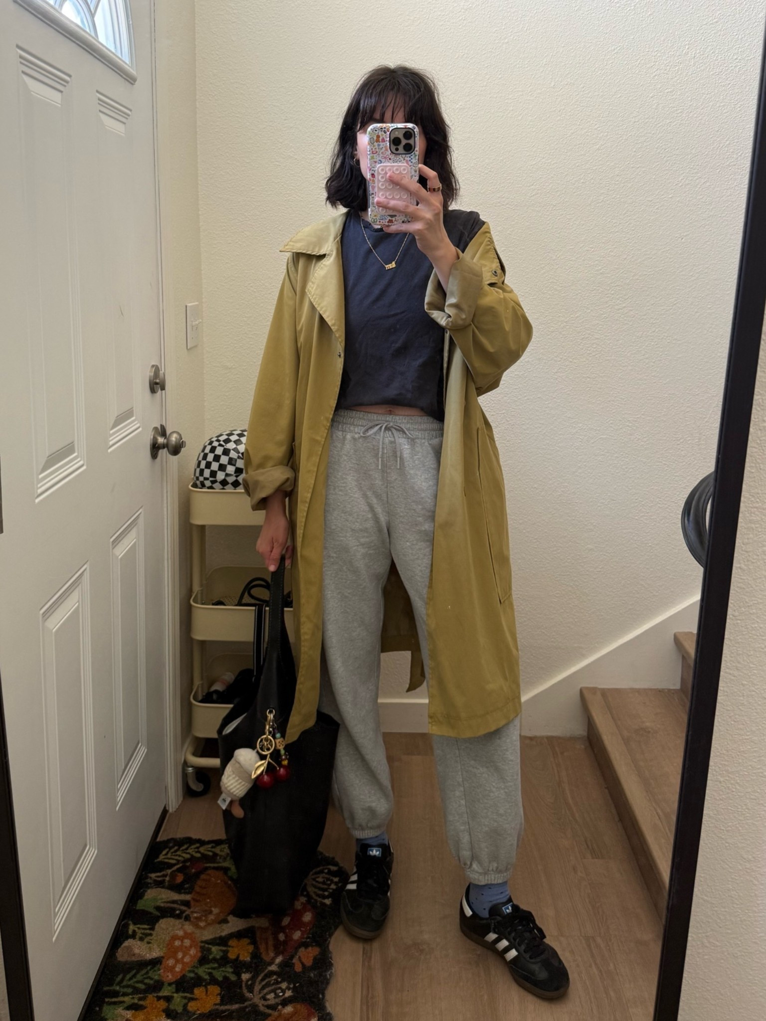 June 27 ootd 🛴 in a surprise to everyone, I wore sweats out of the house! This was the perfect fit for an early sensory showing of Toy Story 5 🤍 I’ve had this shirt for years, they last forever!!!! Sweats are on sale. So are the trench coats I linked - that was thrifted though!

#LTKootd #LTKmomlife #LTKSaleAlert