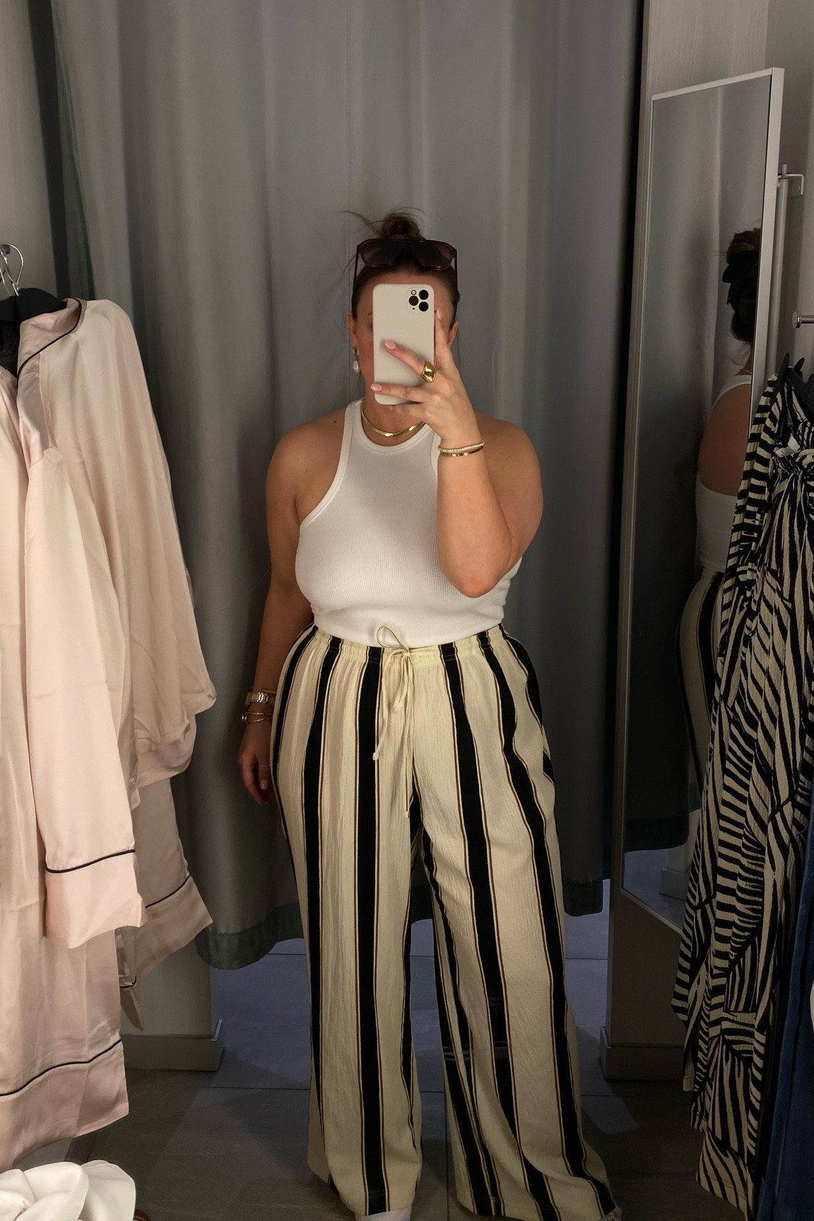 Wearing a size L in the pants! I bought these in every color they are so comfy and flattering 🤍

#LTKSpringSale #LTKMidsize #LTKTravel