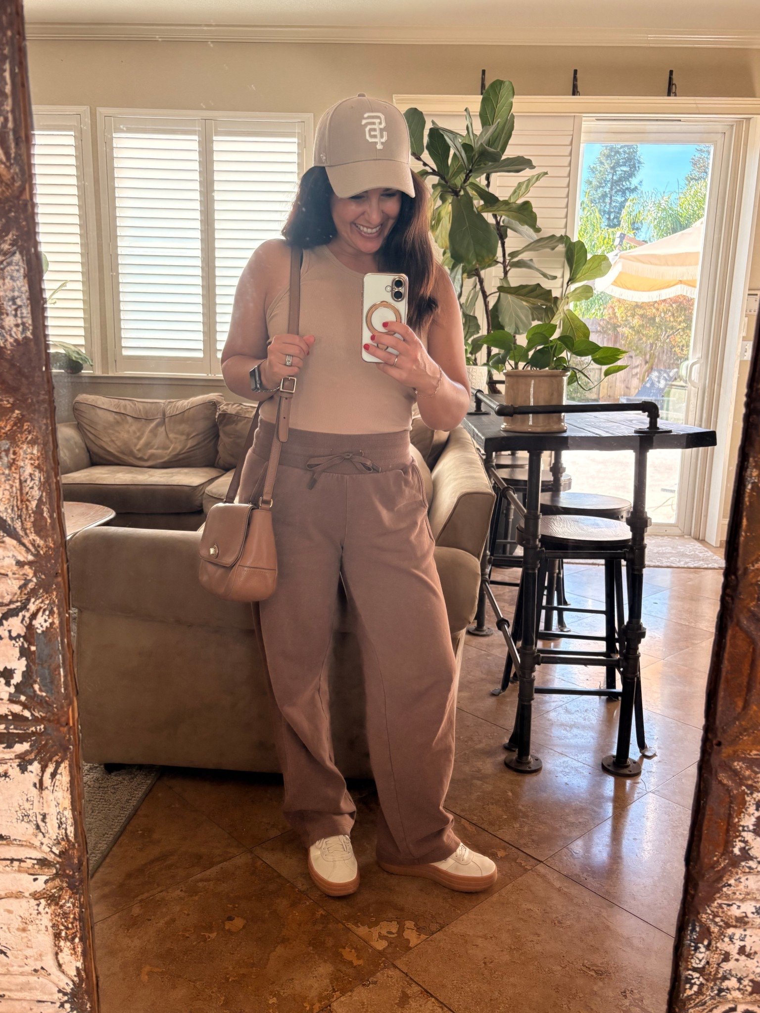 One soccer game and two basketball games on the agenda for today. I love this chocolate brown two piece set. I opted to leave the top in the car, it’s almost 80° today! I’m wearing a small. Sports mom weekend look

#LTKTravel #LTKPetite #LTKActive
