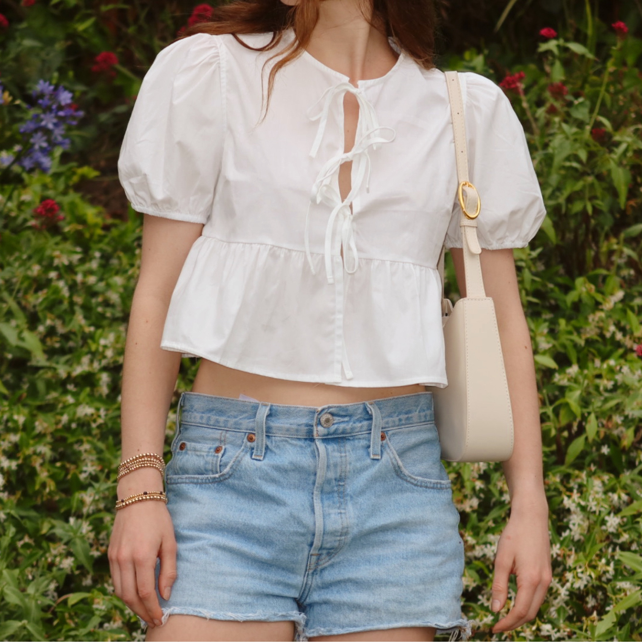 Cutest bow shirt for summer! 

#LTKSeasonal #LTKStyleTip #LTKFindsUnder50