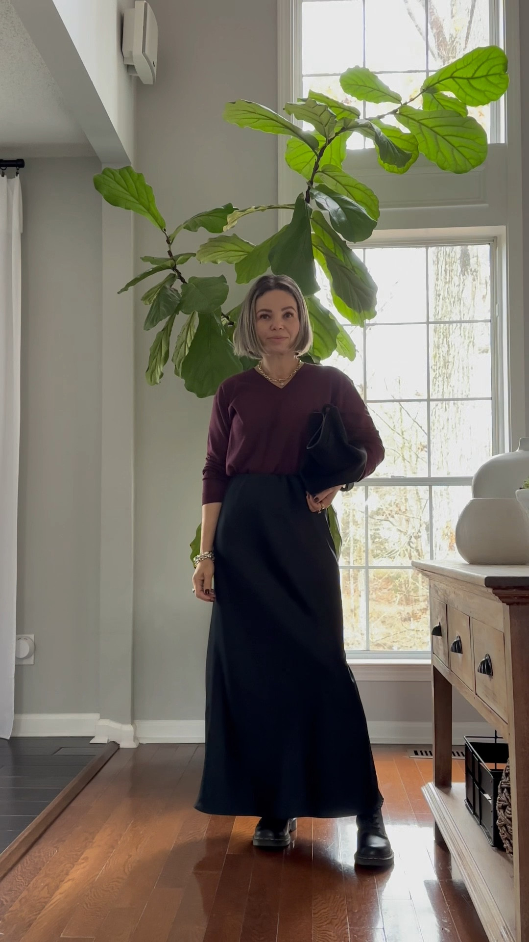 Burgundy V neck sweater paired with satin midi skirt, Dr. Martens and faux fur coat 

#LTKGiftGuide #LTKgrwm #LTKHoliday