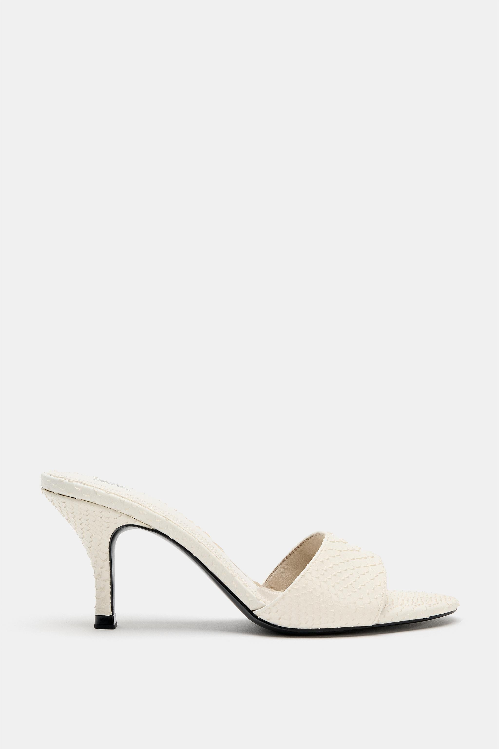 Model height: 181 cmEmbossed animal print heeled mules. Wide front strap. High stiletto heel. Rou... | Zara UK
