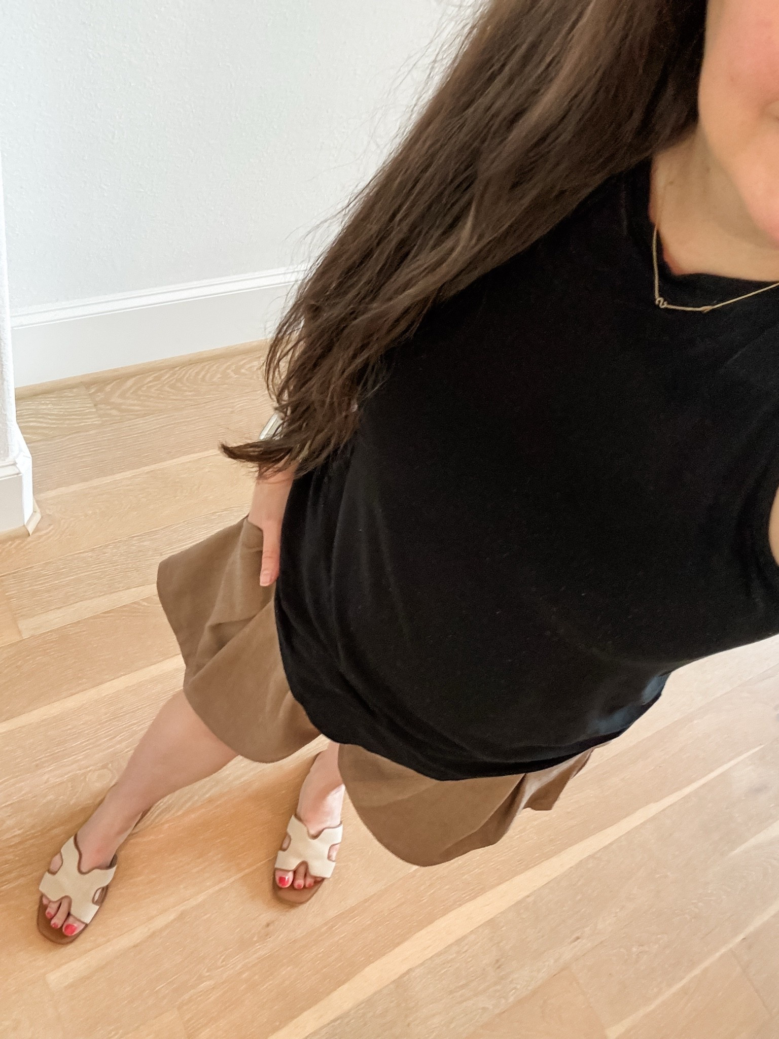 Brown trouser shorts are such a good way to make a basic black tee feel instantly more polished. I love this combination for an elevated casual summer outfit, vacation outfits or an easy dressy casual look.

Summer outfit, vacation outfits, elevated casual style and mom style.

#LTKSeasonal #LTKootd #LTKOver40