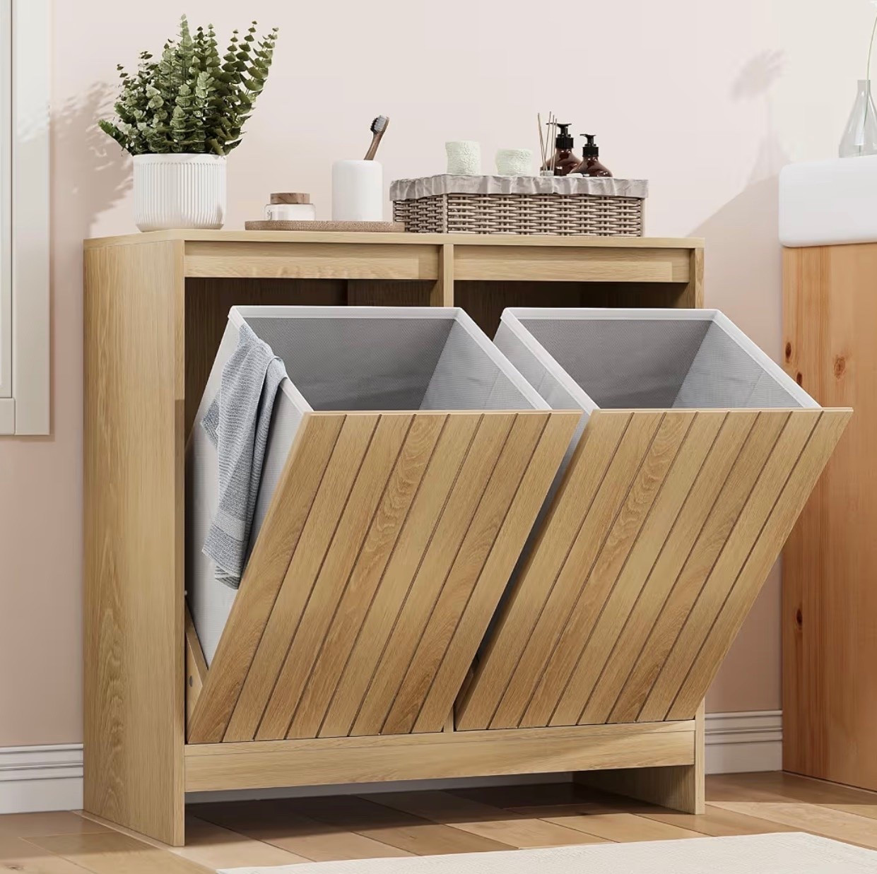 This stylish double hamper is perfect for keeping your living space tidy. It's great for bathroom, kitchen, or even the living room. So convenient and space-saving!

#LTKmomlife #LTKHome #LTKselfcare