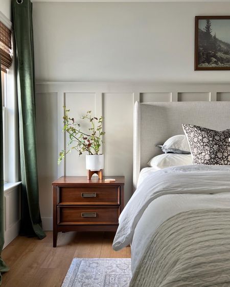 Neutral bedroom // green velvet curtains // cream upholstered bed // wooden nightstands // primary bedroom // transitional bedroom 

#LTKhome
